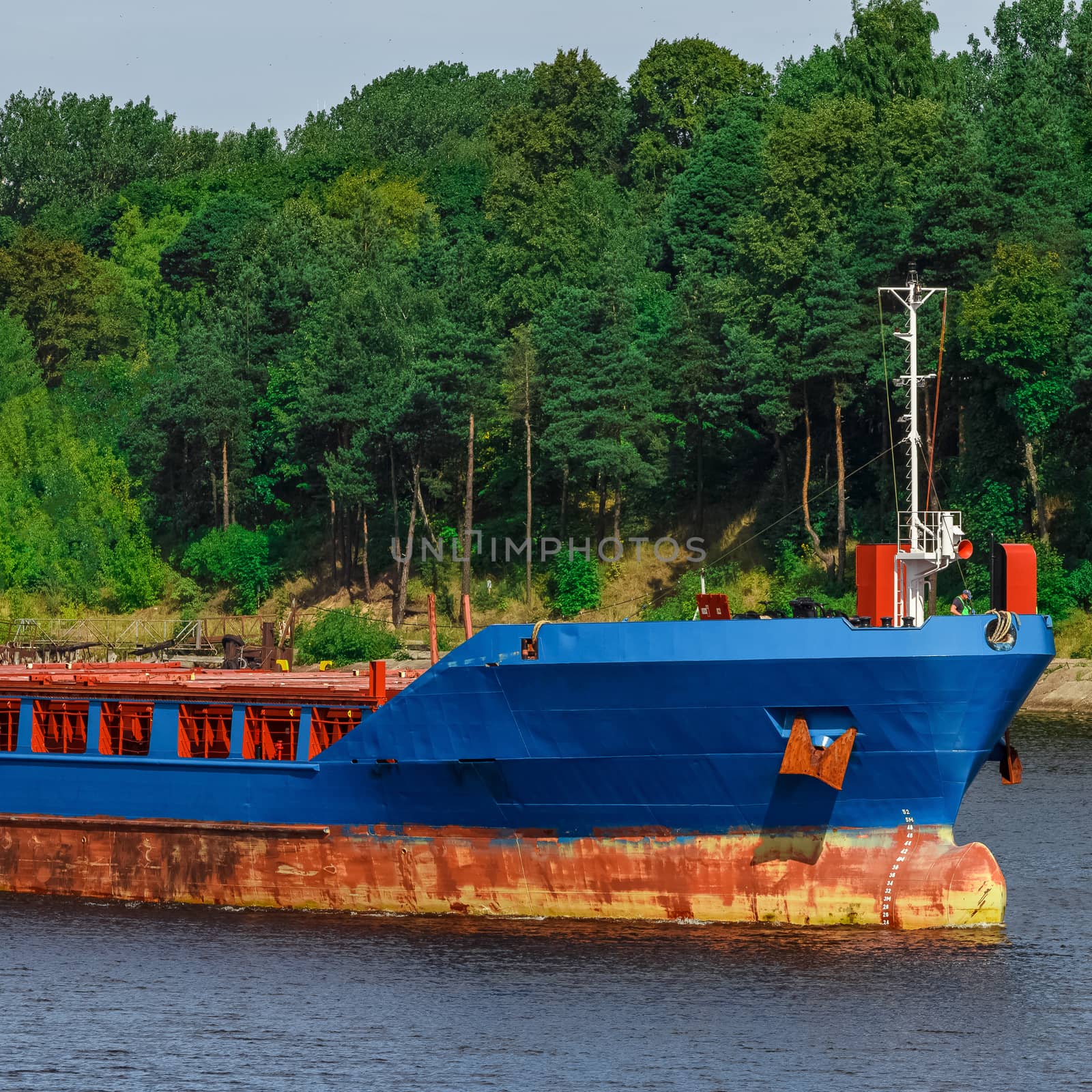 Blue cargo ship by sengnsp