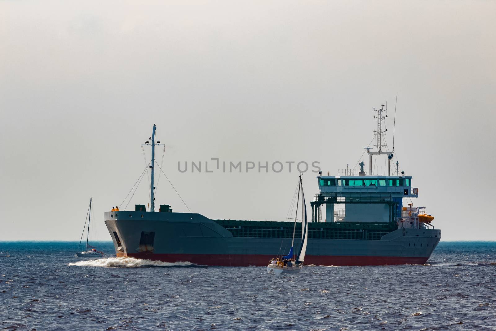 Grey cargo ship by sengnsp