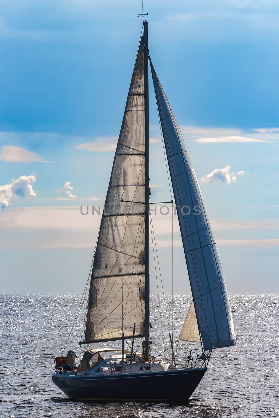 Blue sailboat at journey by sengnsp