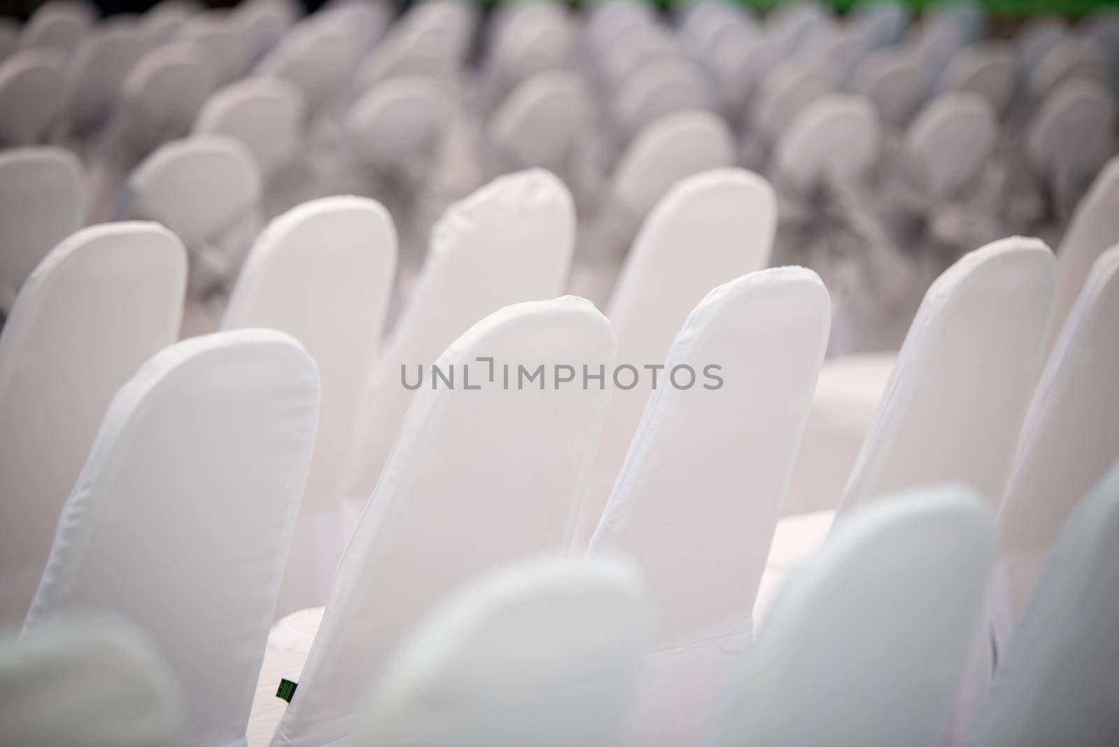 chair with white cover cloth in conference room