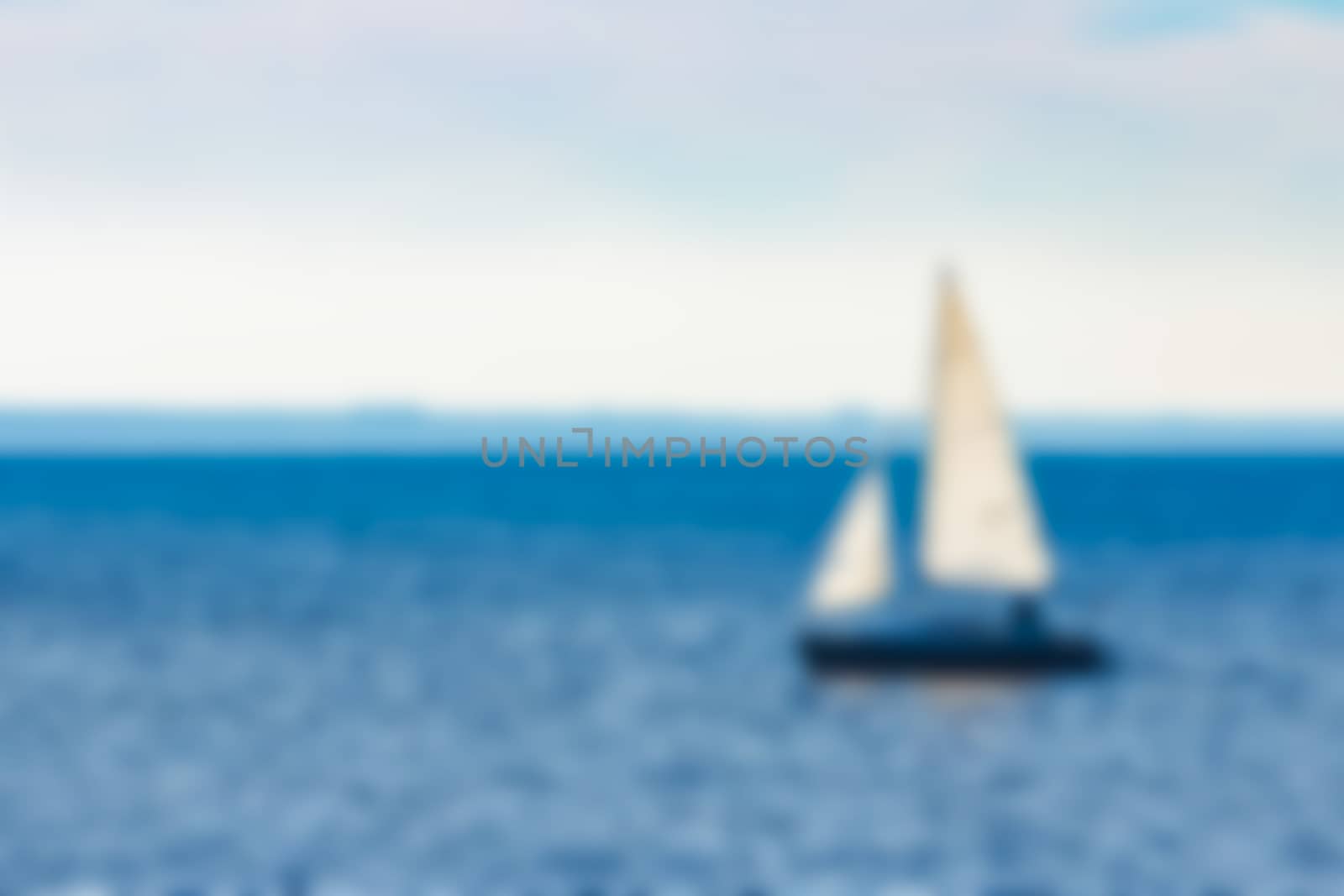 Yacht in the sea - blurred image by sengnsp