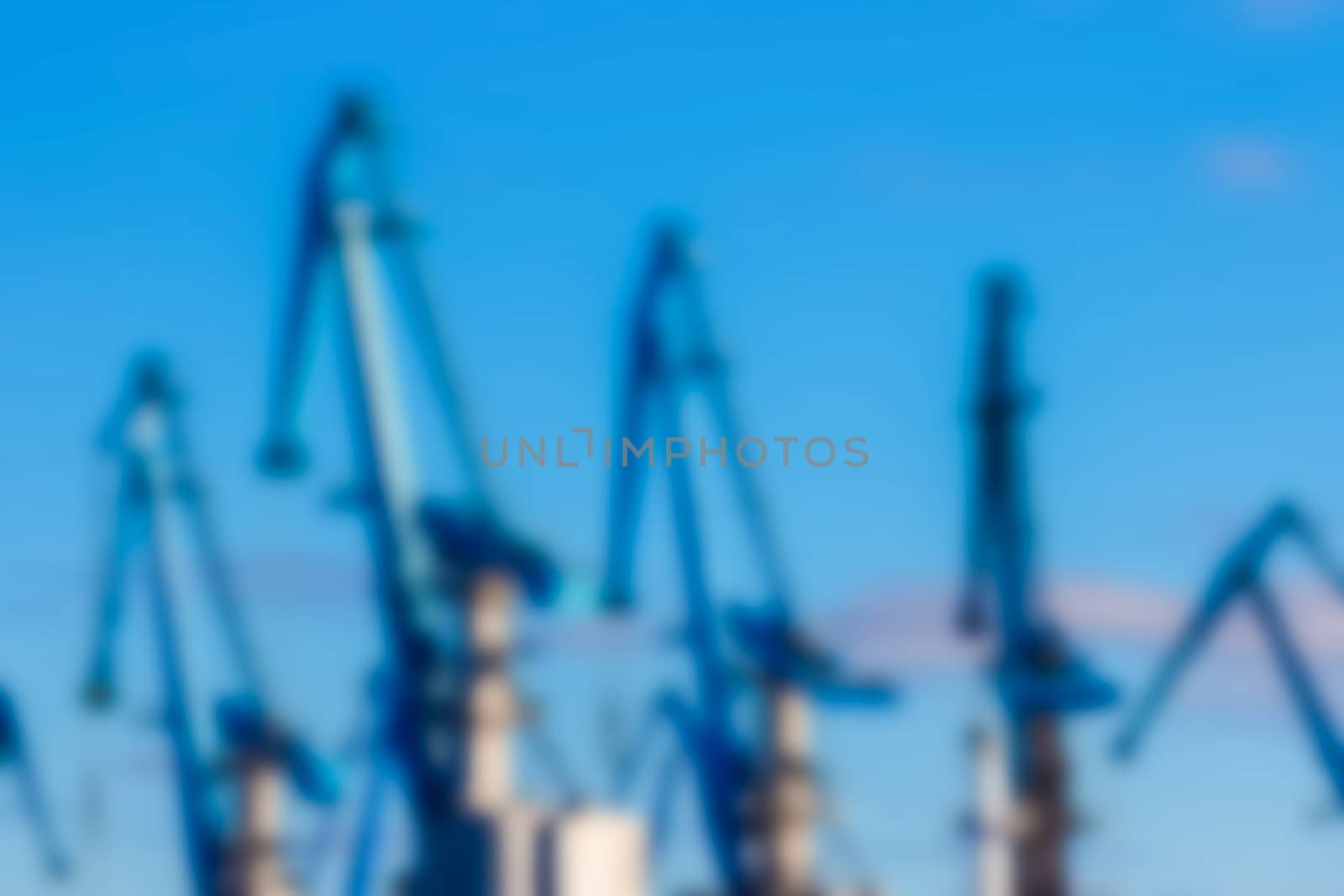 Portal cargo cranes - soft lens bokeh image. Defocused background