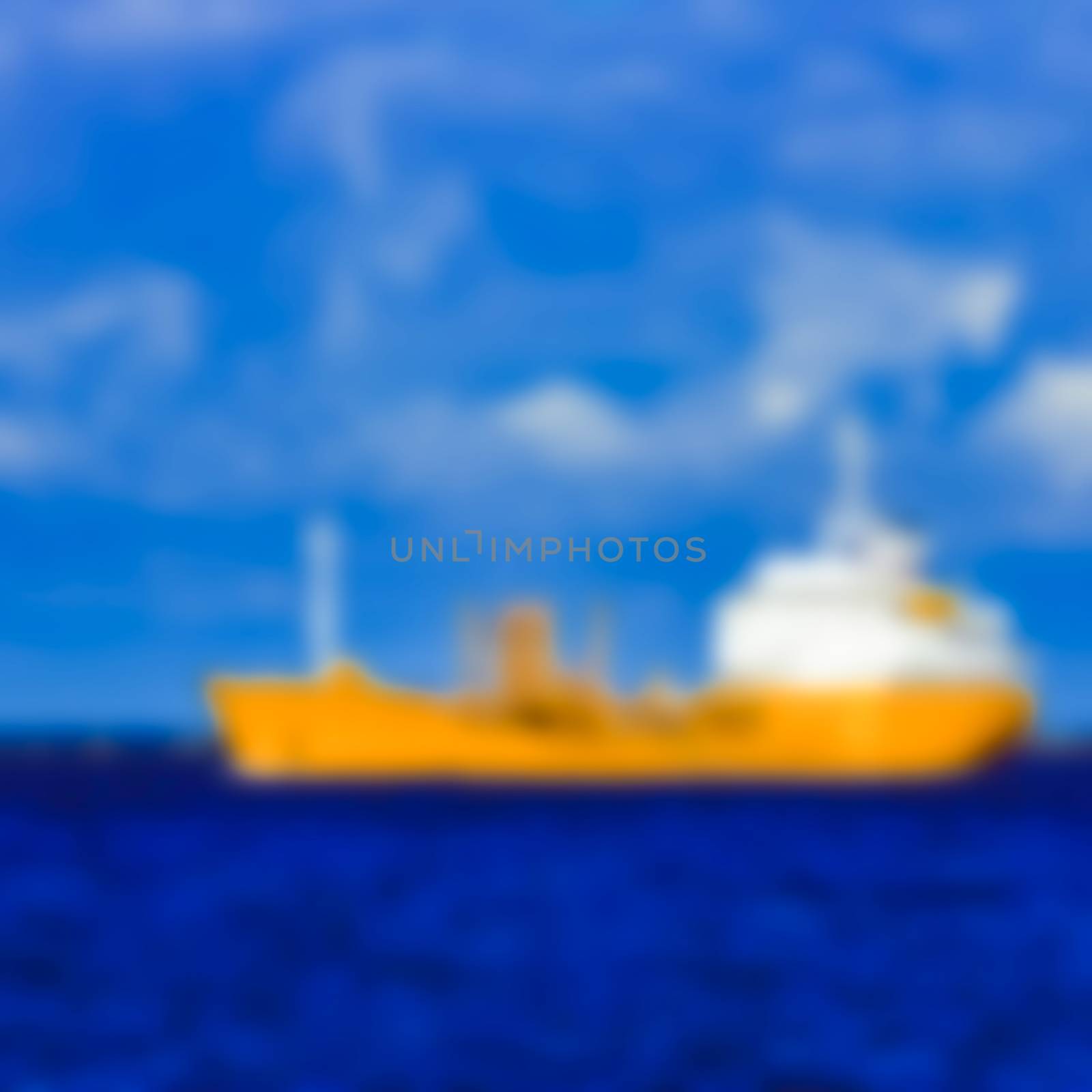Cargo ship - soft lens bokeh image. Defocused background