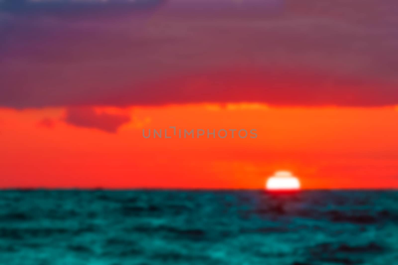Hot sunset - blurred image by sengnsp