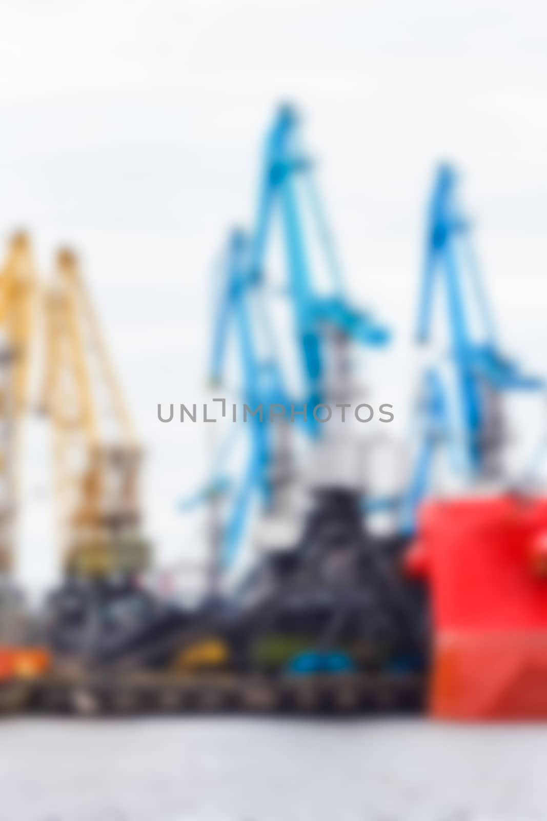 Portal cargo cranes - blurred image by sengnsp
