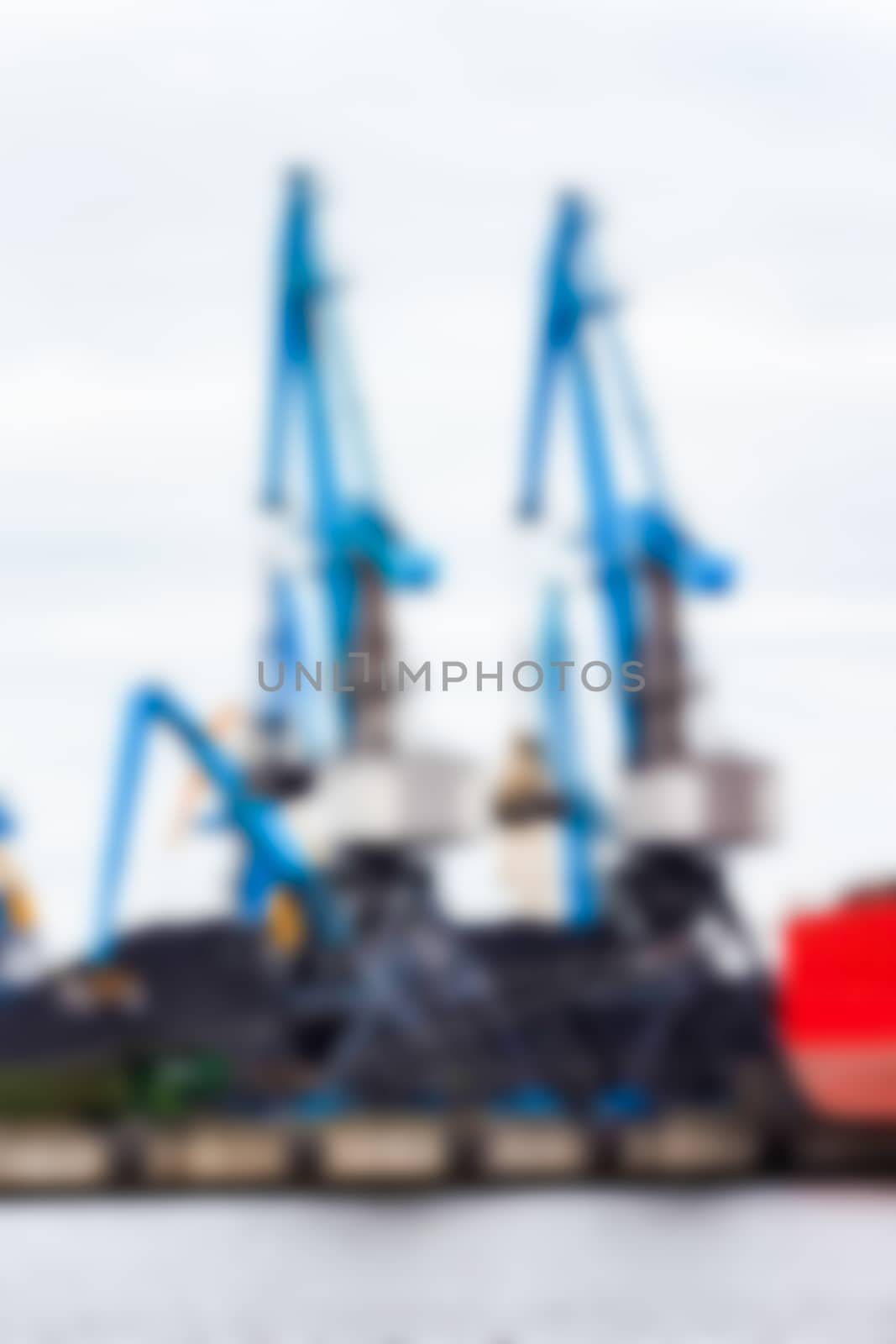 Portal cargo cranes - soft lens bokeh image. Defocused background