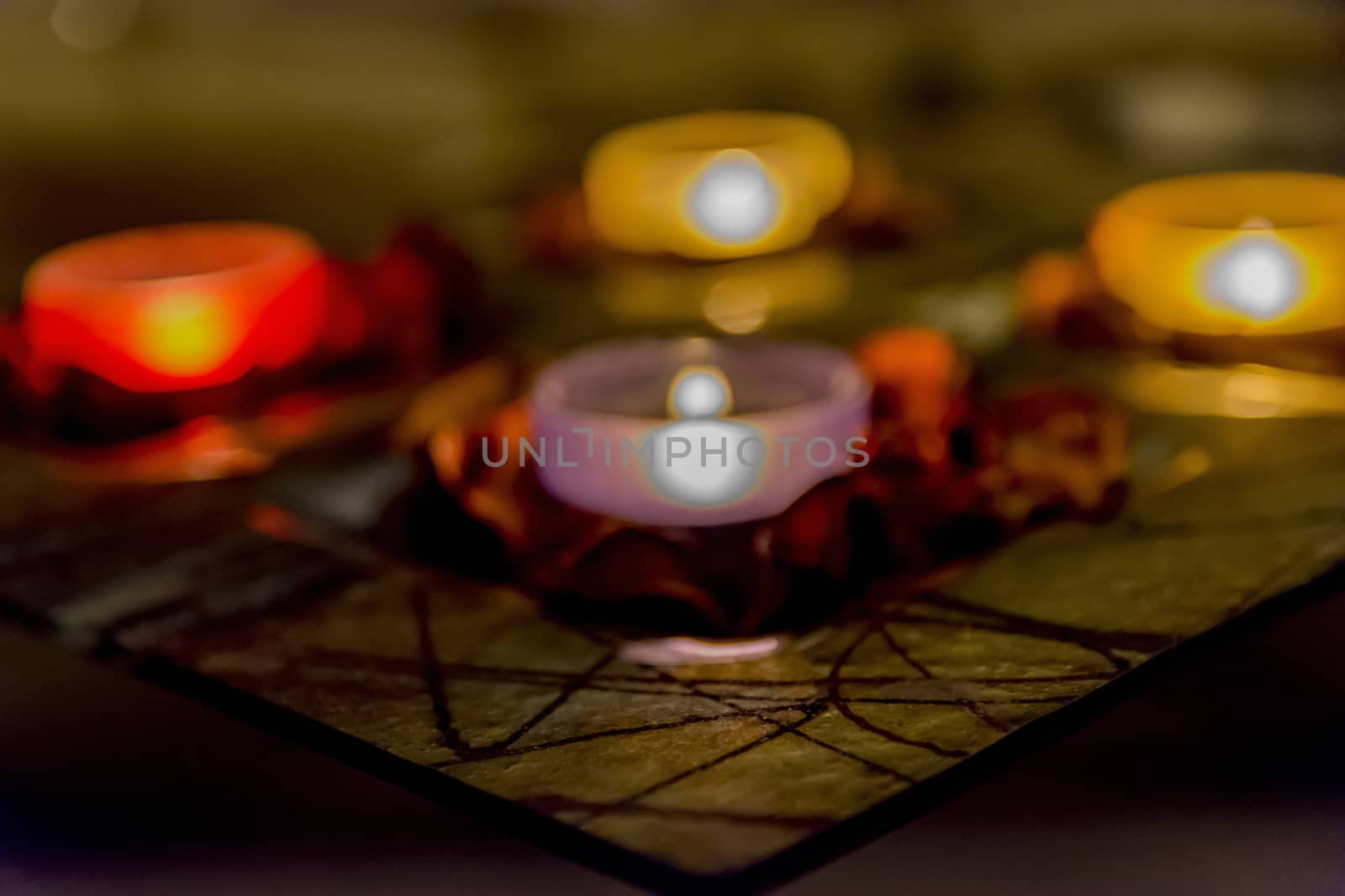 few candles in the table with romantic atmosphere