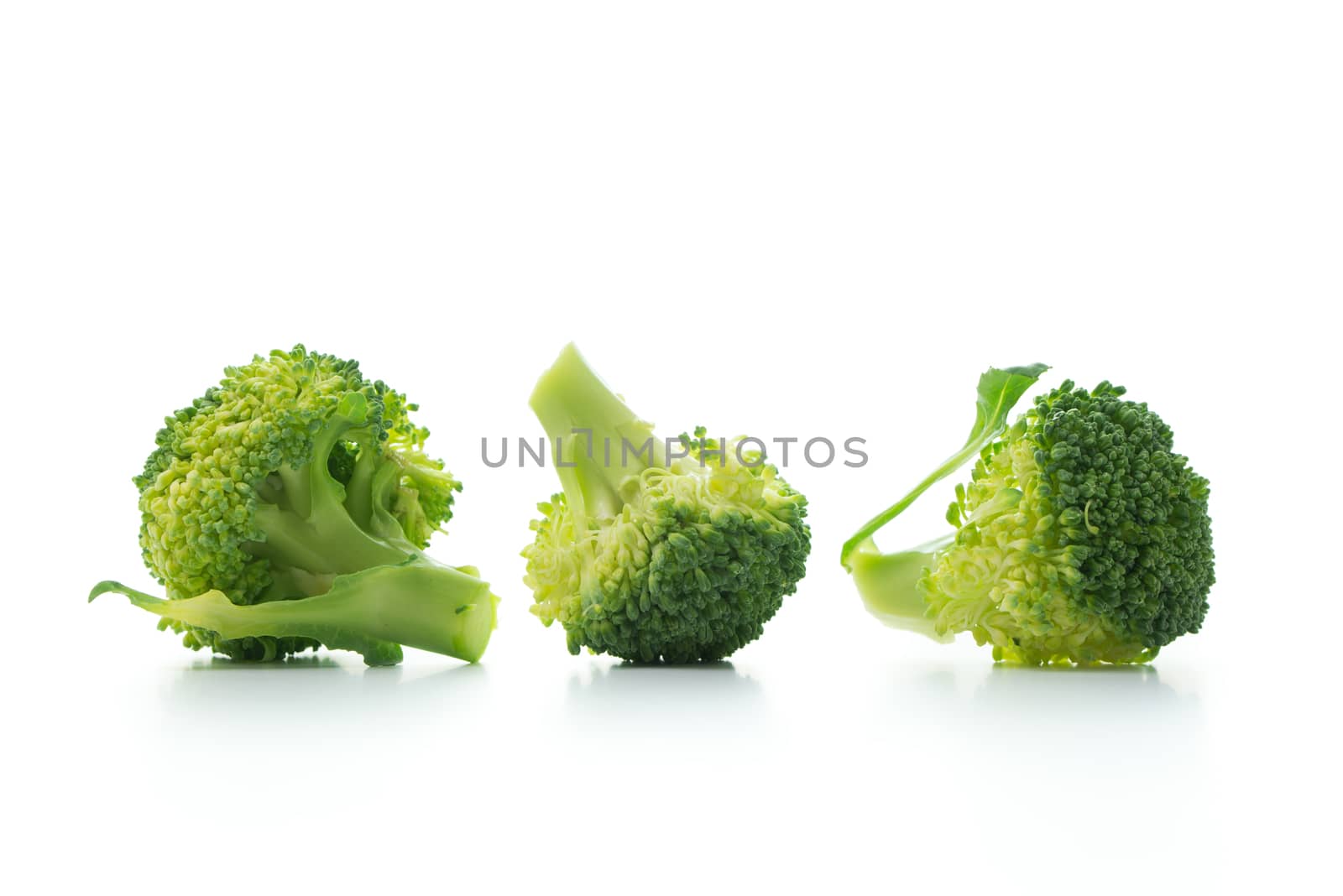 Broccoli isolated on white background by Kenishirotie