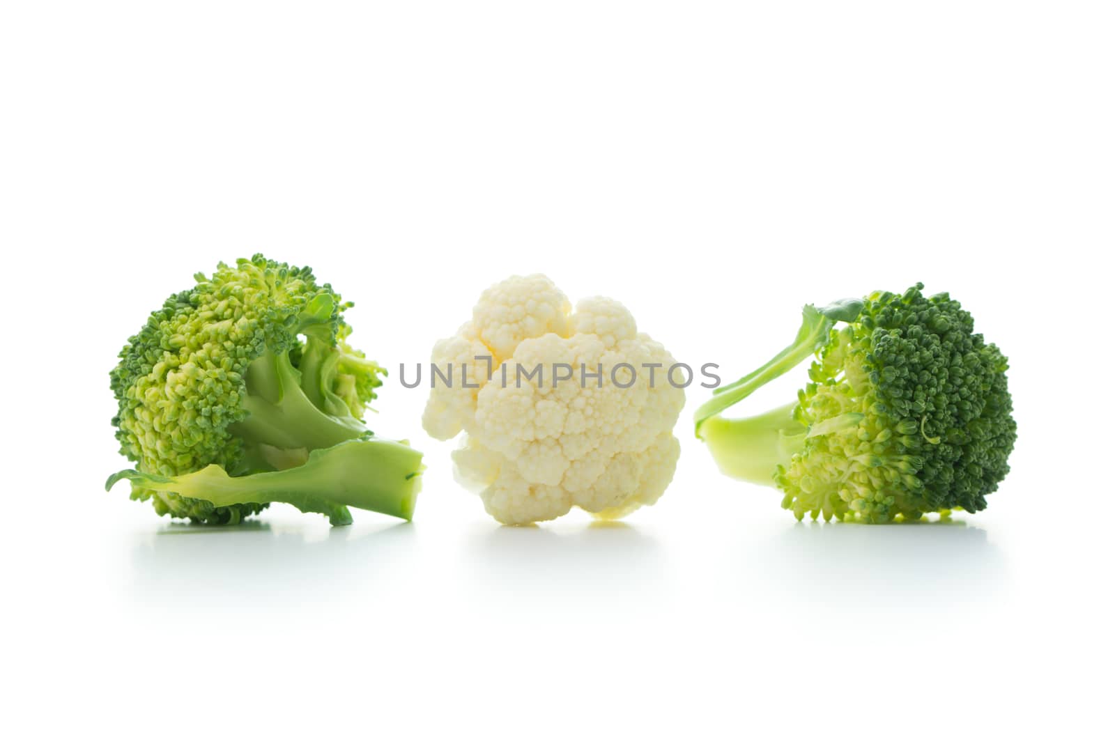 Broccoli and cauliflower isolated on white background by Kenishirotie