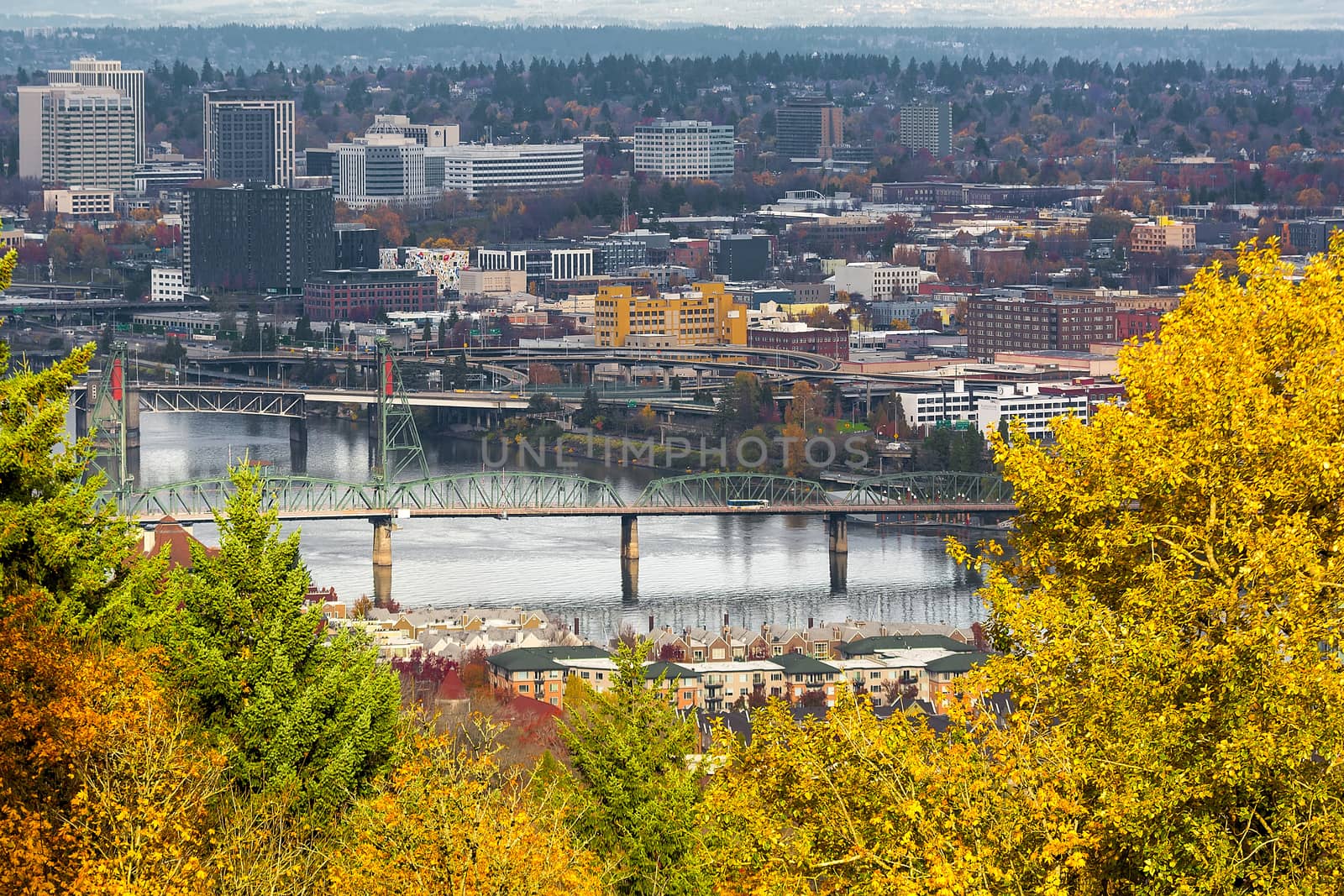 Hawthorne Bridge over Willamette River in downtown Portland Oregon in Fall Season