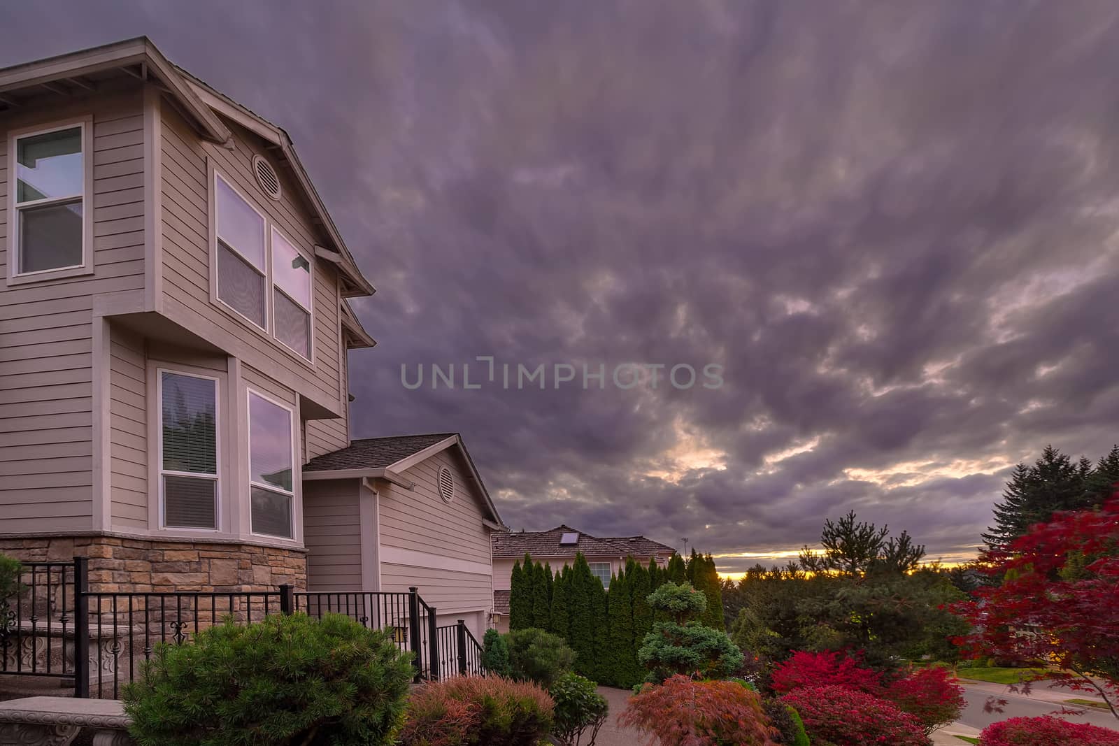 Stormy Sky over Homes in Suburban Neighborhood by jpldesigns