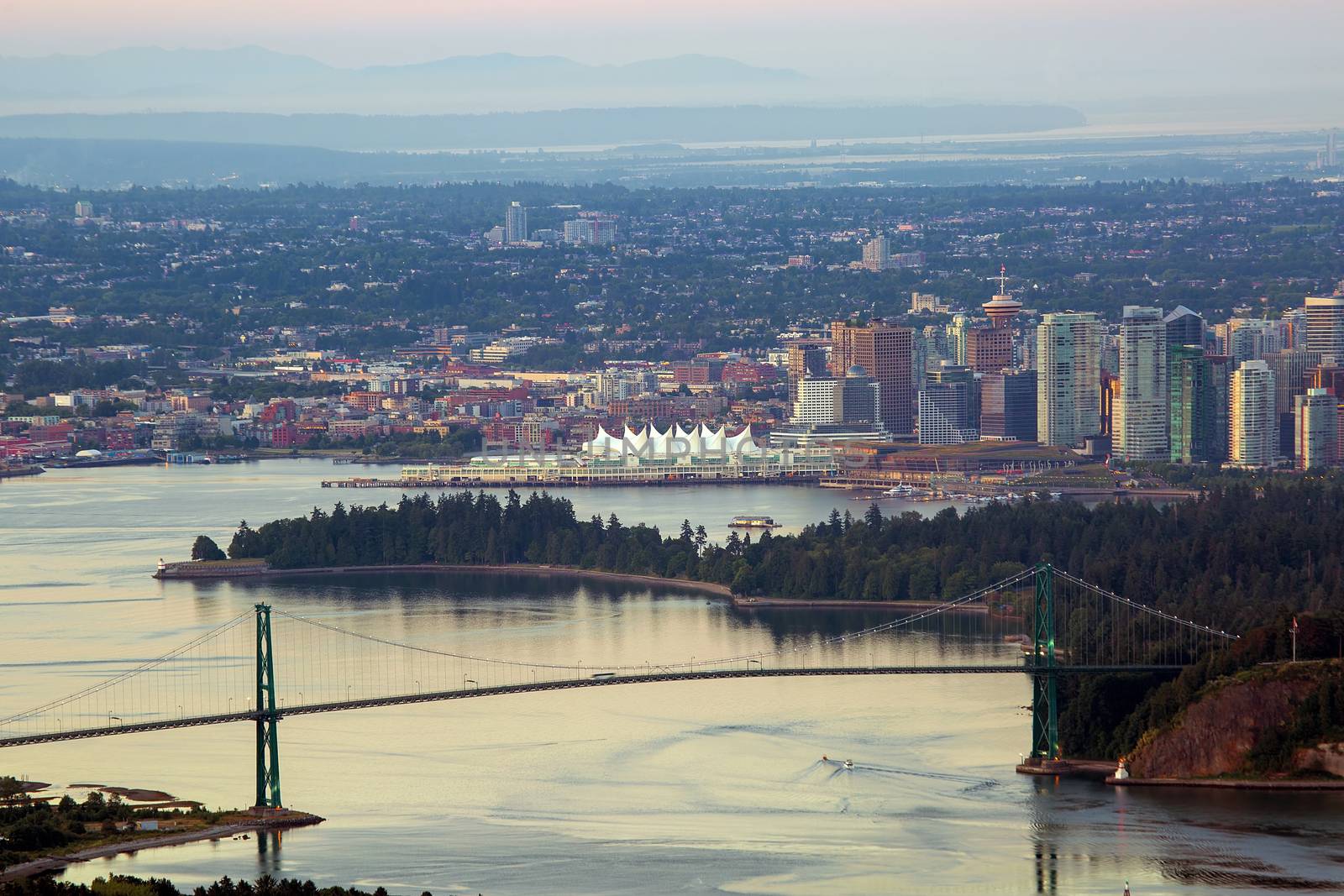 Vancouver British Columbia Canada city skyline by Stanley Park Lions Gate Bridge scenic view