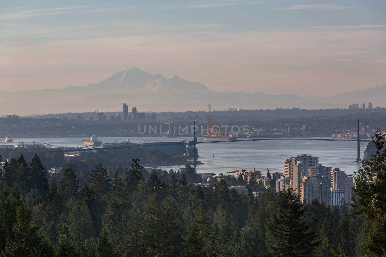 Port of Vancouver British Columbia Canada by Lions Gate Bridge with Mount Baker view in the morning