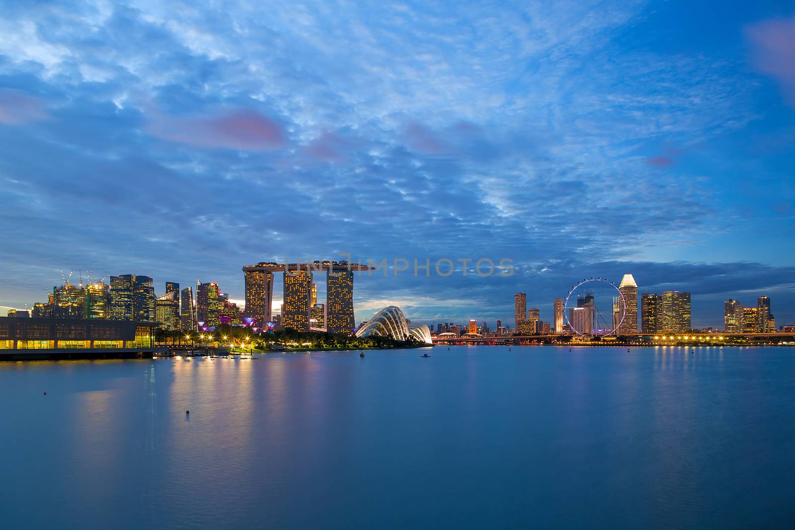 Singapore entertainment tourist central business district city skyline during evening blue hour