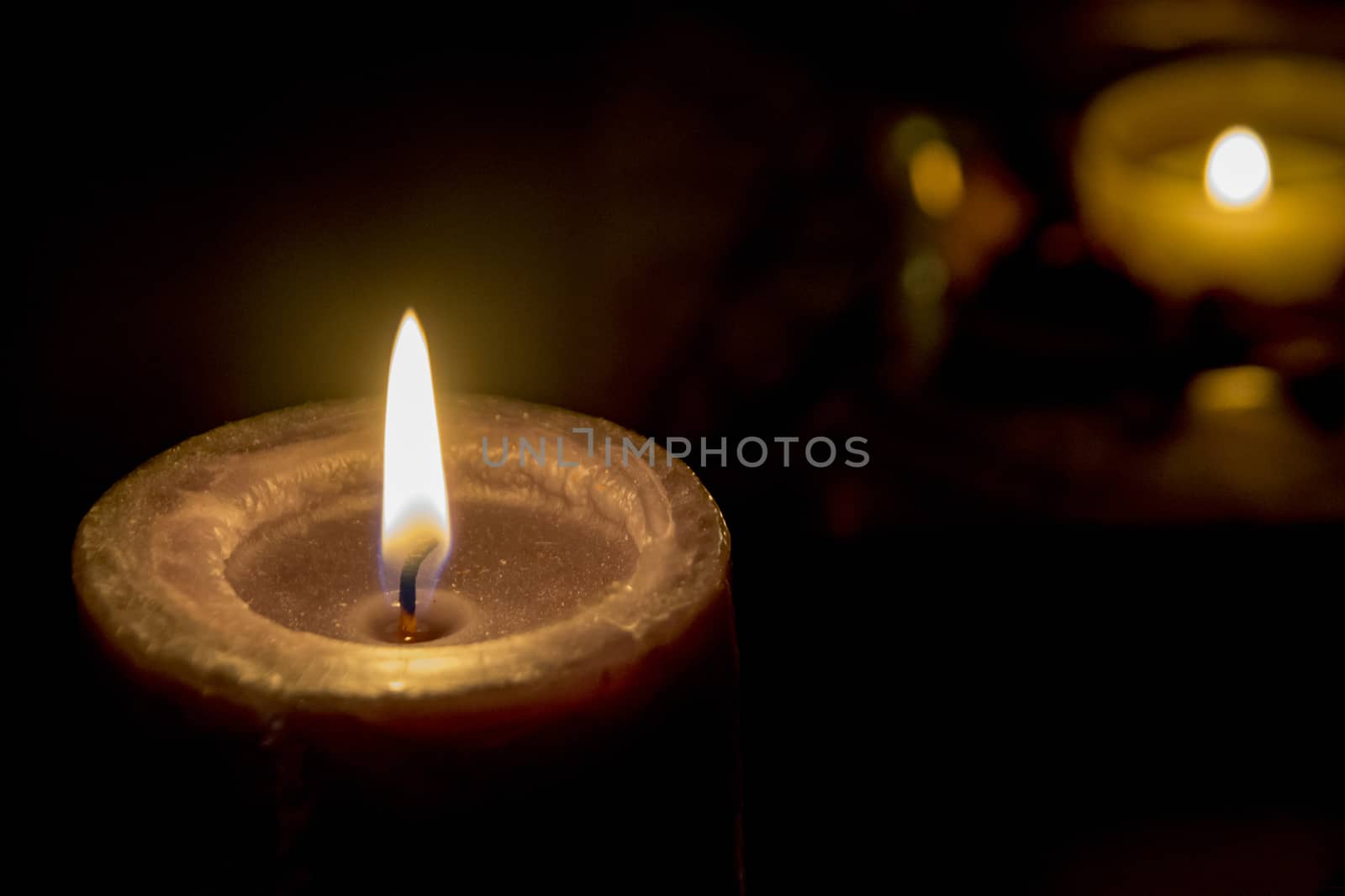 few candles in the table with romantic atmosphere