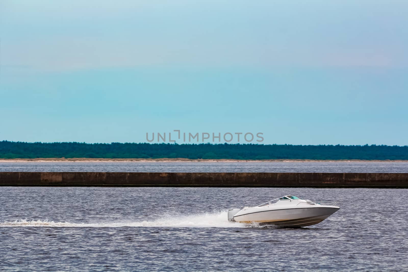 White speed boat in action by sengnsp