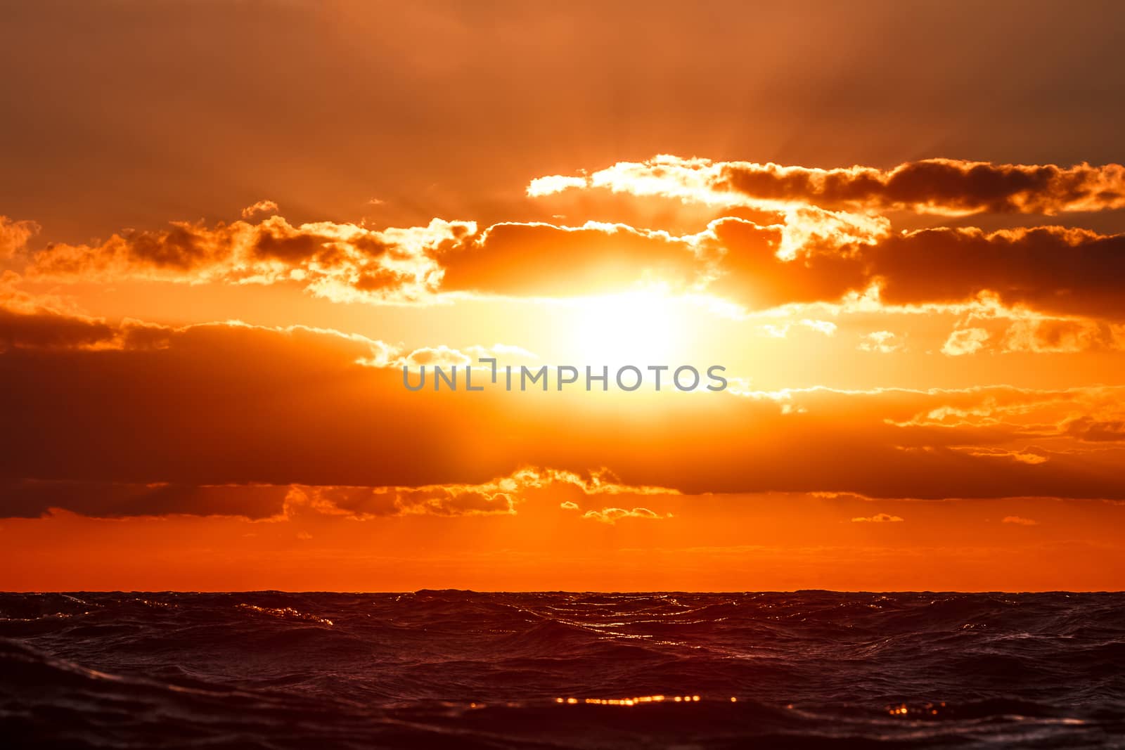 Hot and romantic sunset over the Baltic sea. Calm landscape