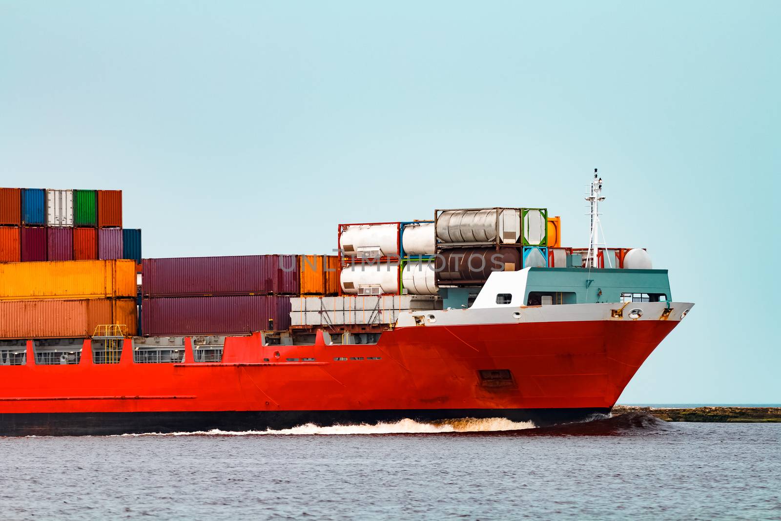 Red container ship. Logistics and production export