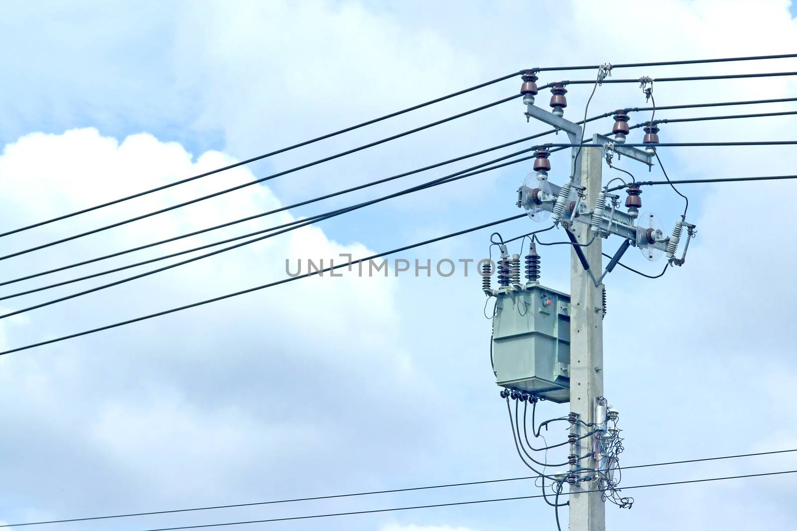 Transformers are on the daylight pole.