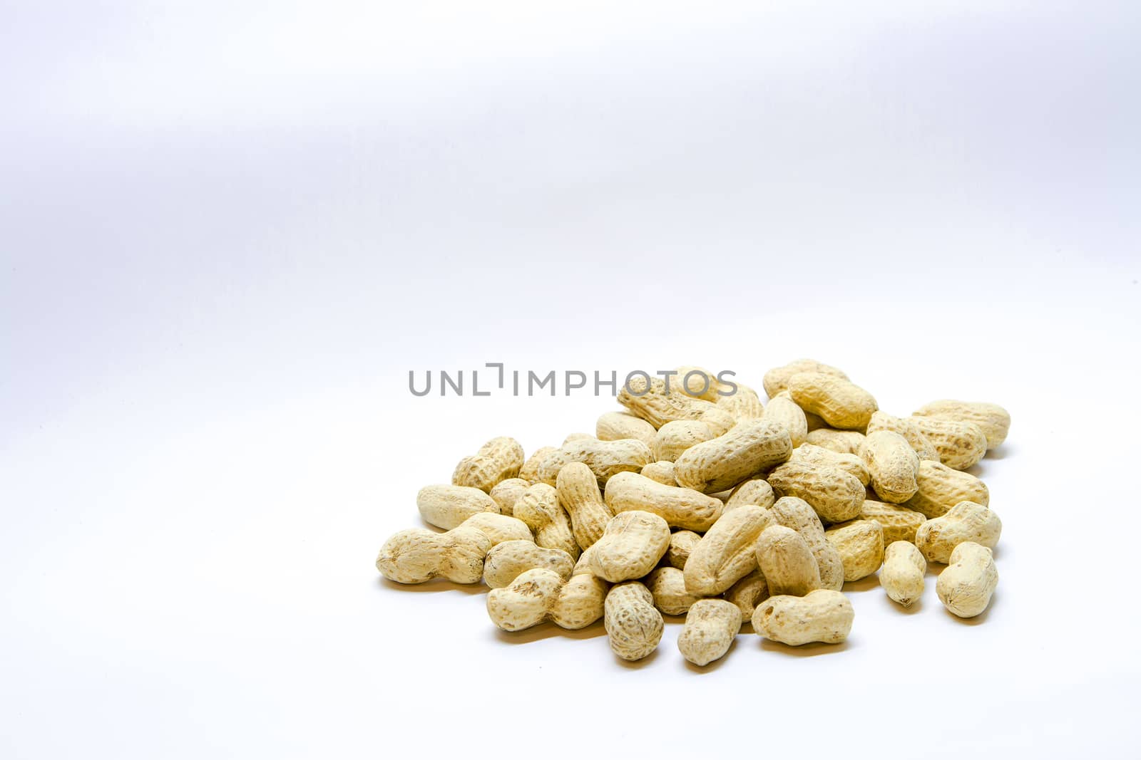 Peanuts on a white background by TakerWalker