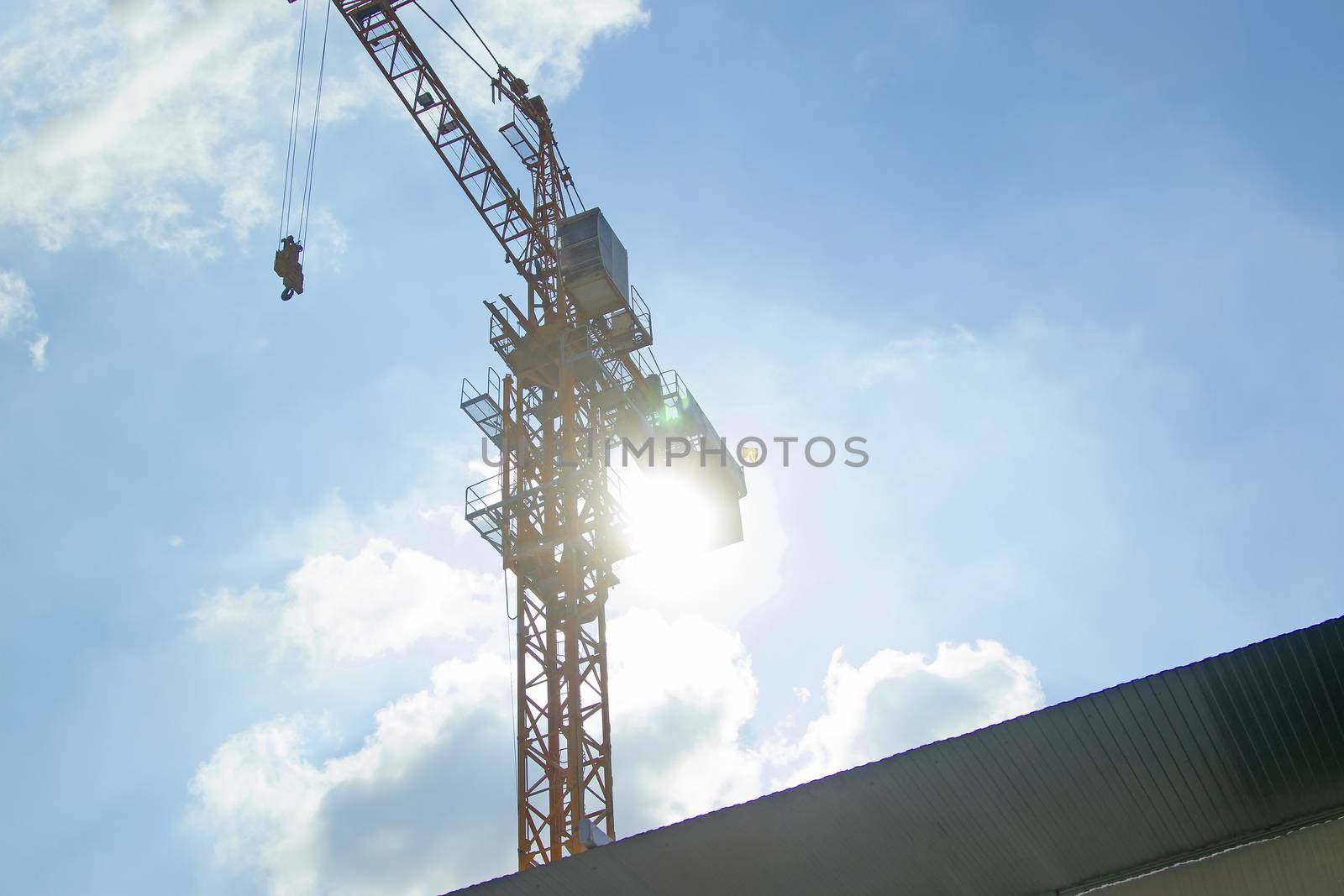 Lifting crane of reverse solar with blue sky by TakerWalker