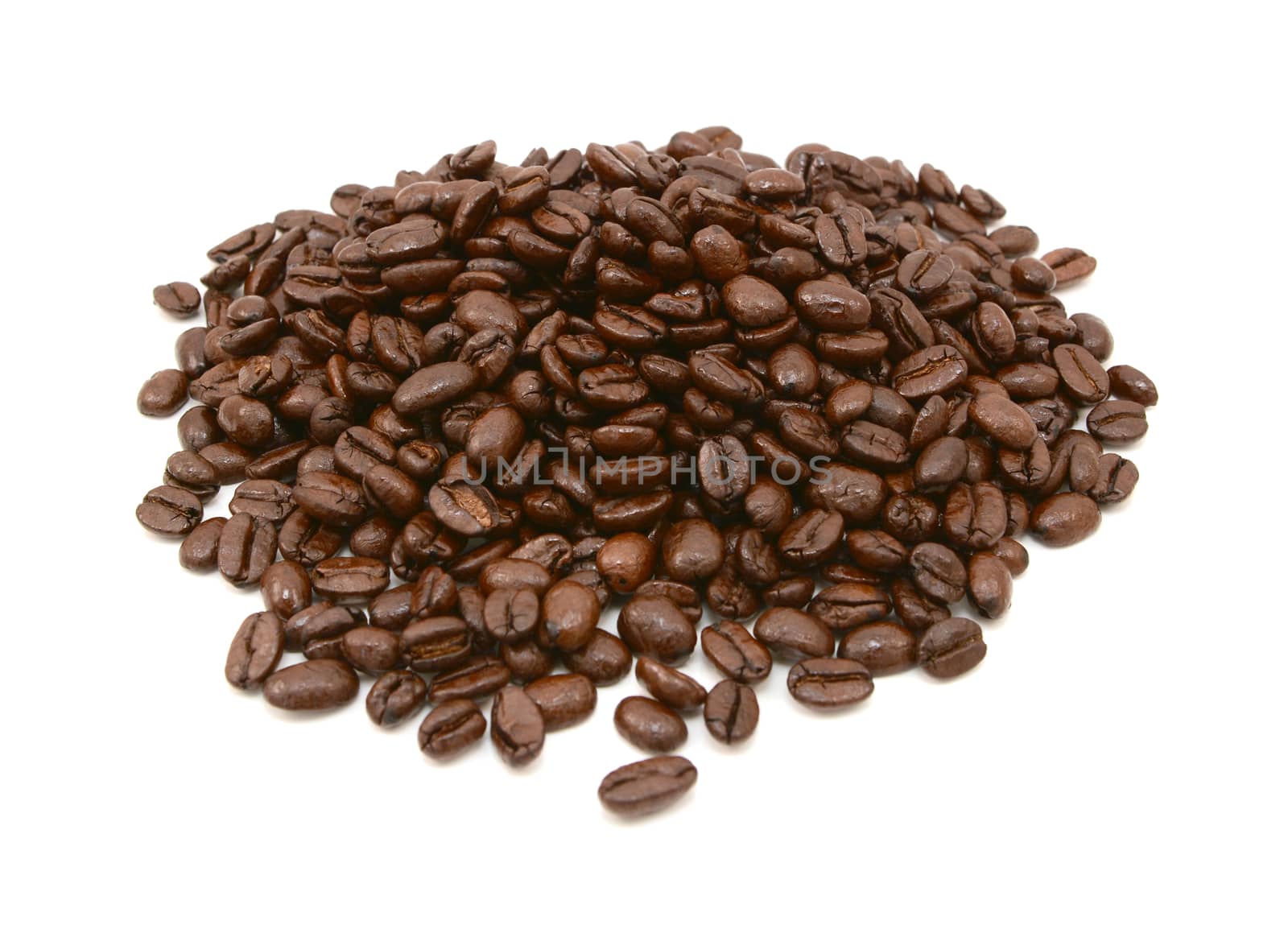 Heap of aromatic coffee beans, on a white background