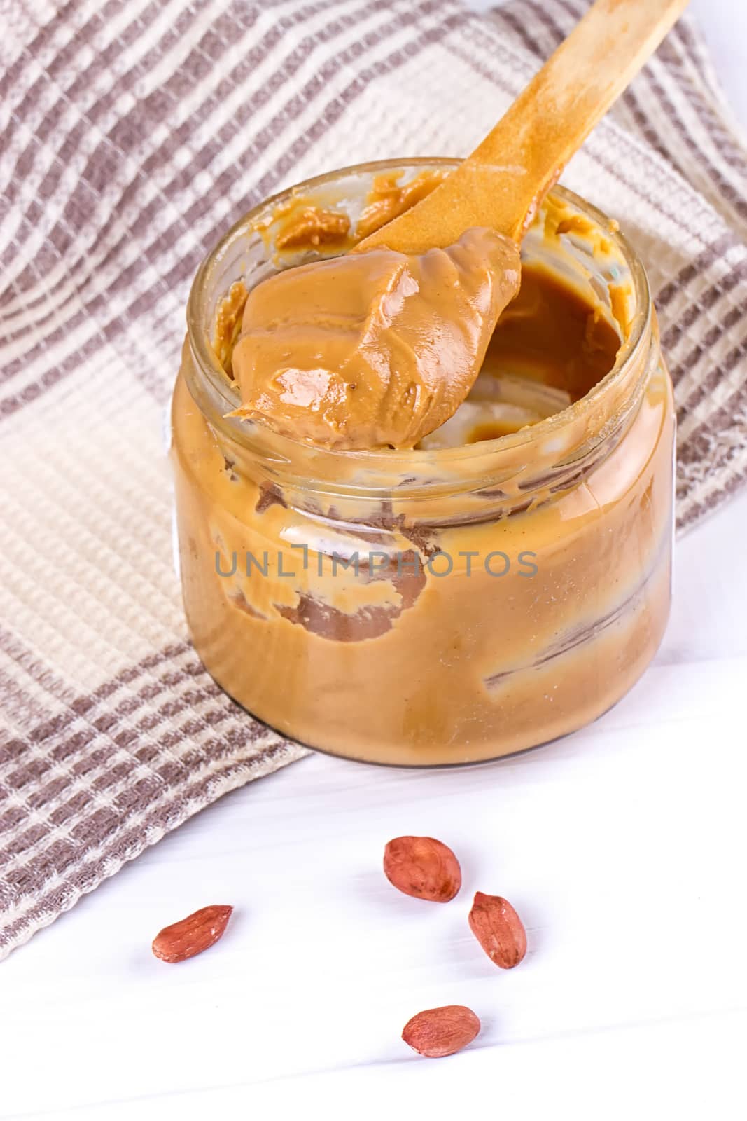 peanut butter with spoon by victosha
