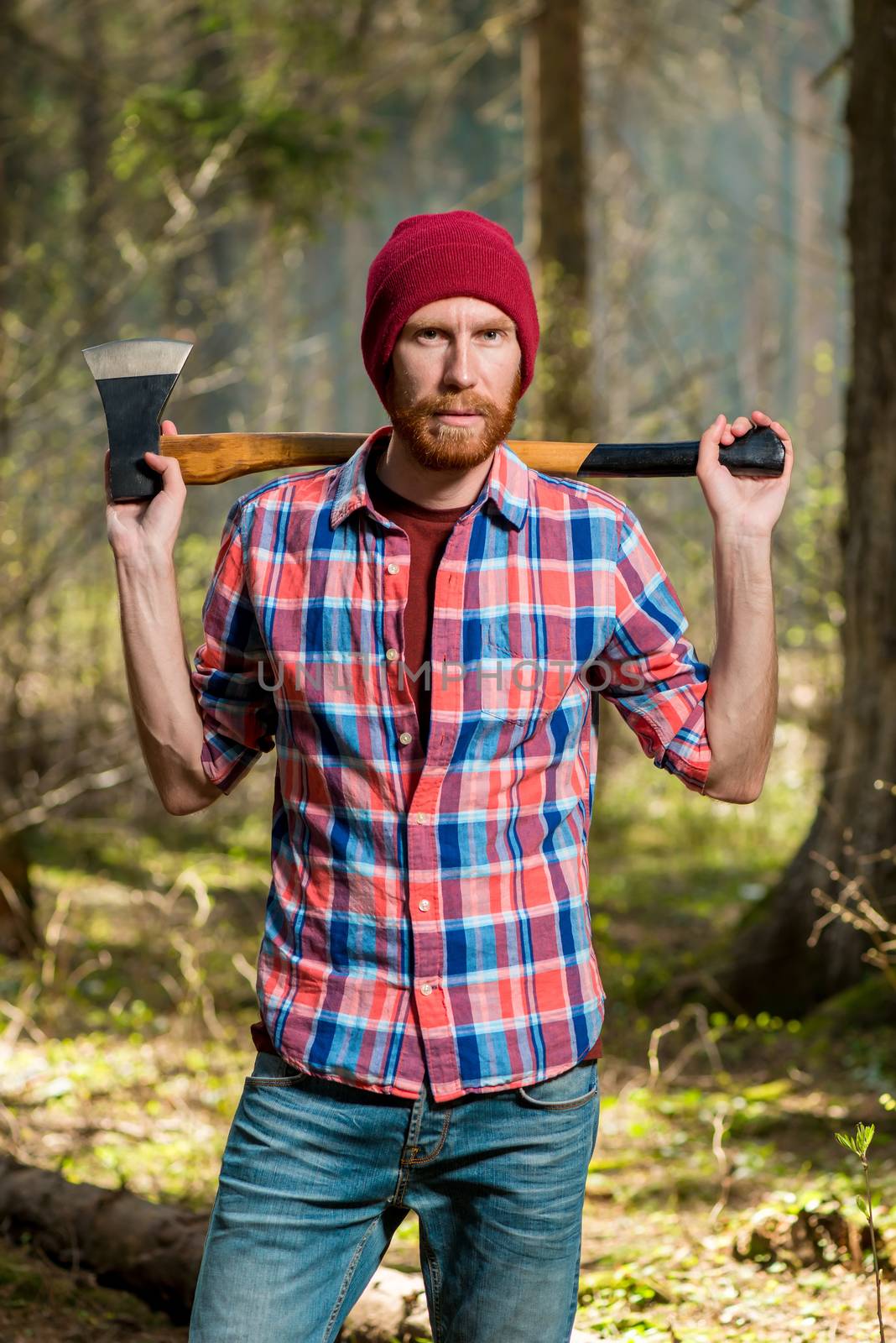 severe bearded forester with an ax vertical portrait in the fore by kosmsos111