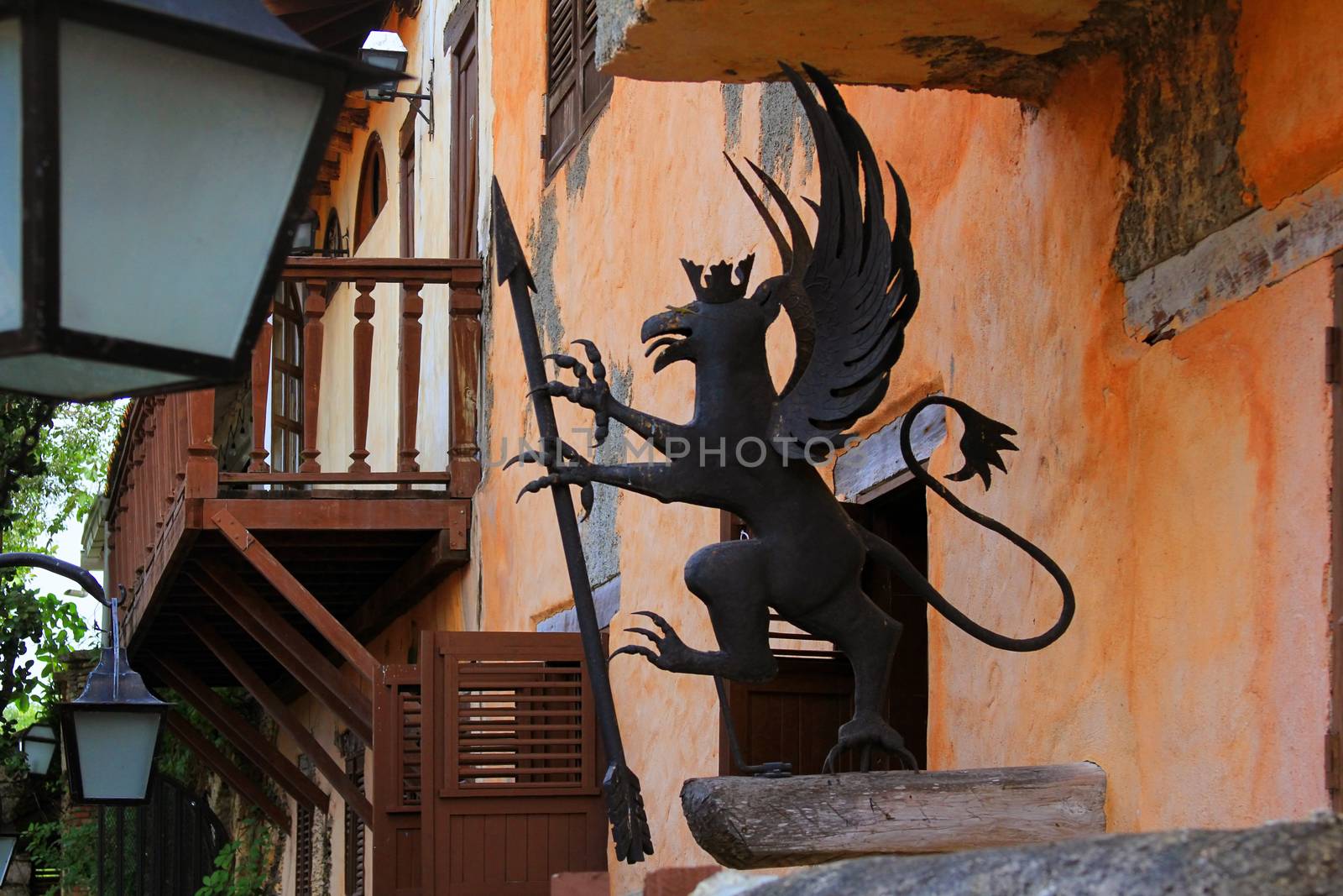 Metal mythical decoration on the facade of the building in Altos de Chavon. Dominican Republic