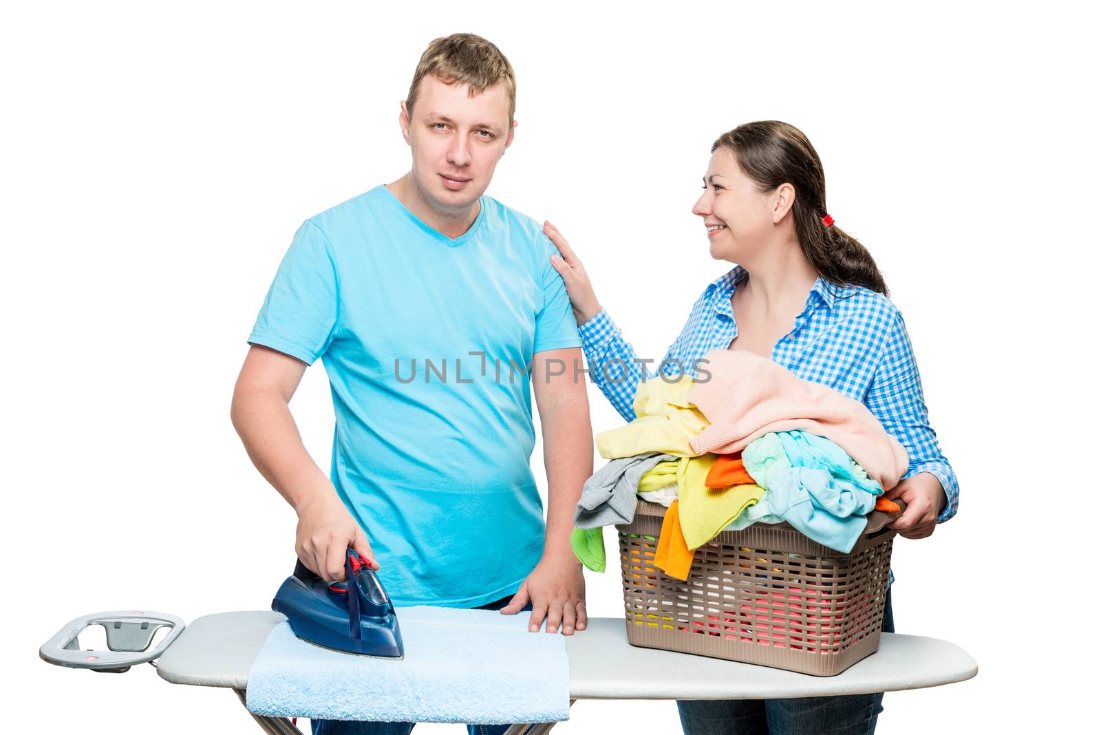 happy married couple while ironing clothes isolated on white bac by kosmsos111