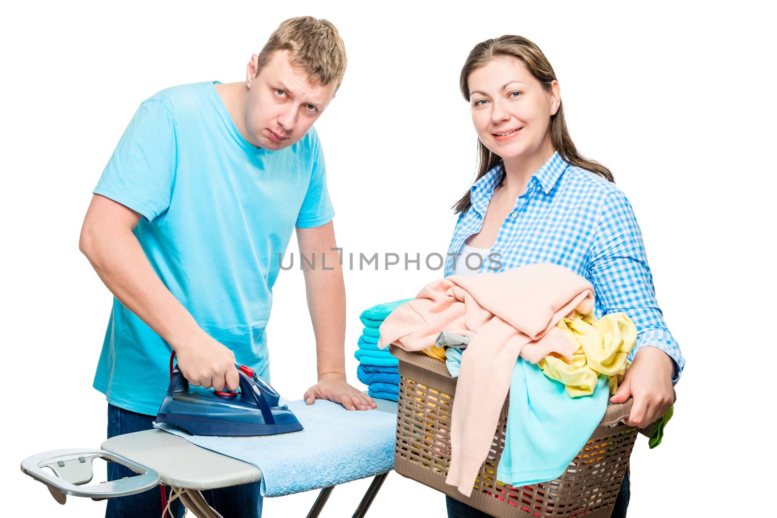 homework, the husband ironing things with an iron on a white background