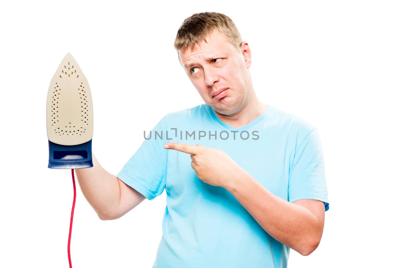 emotional man showing a finger on an iron on a white background by kosmsos111