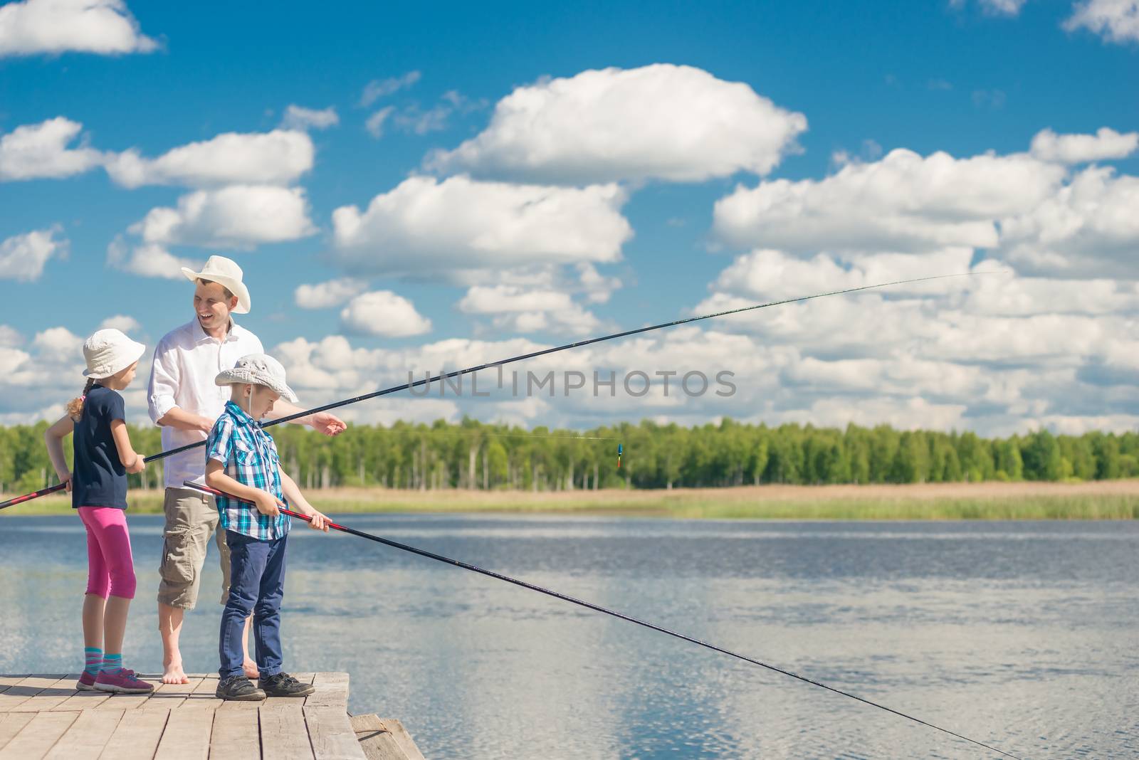 happy family on fishing - father, son and daughter with fishing by kosmsos111