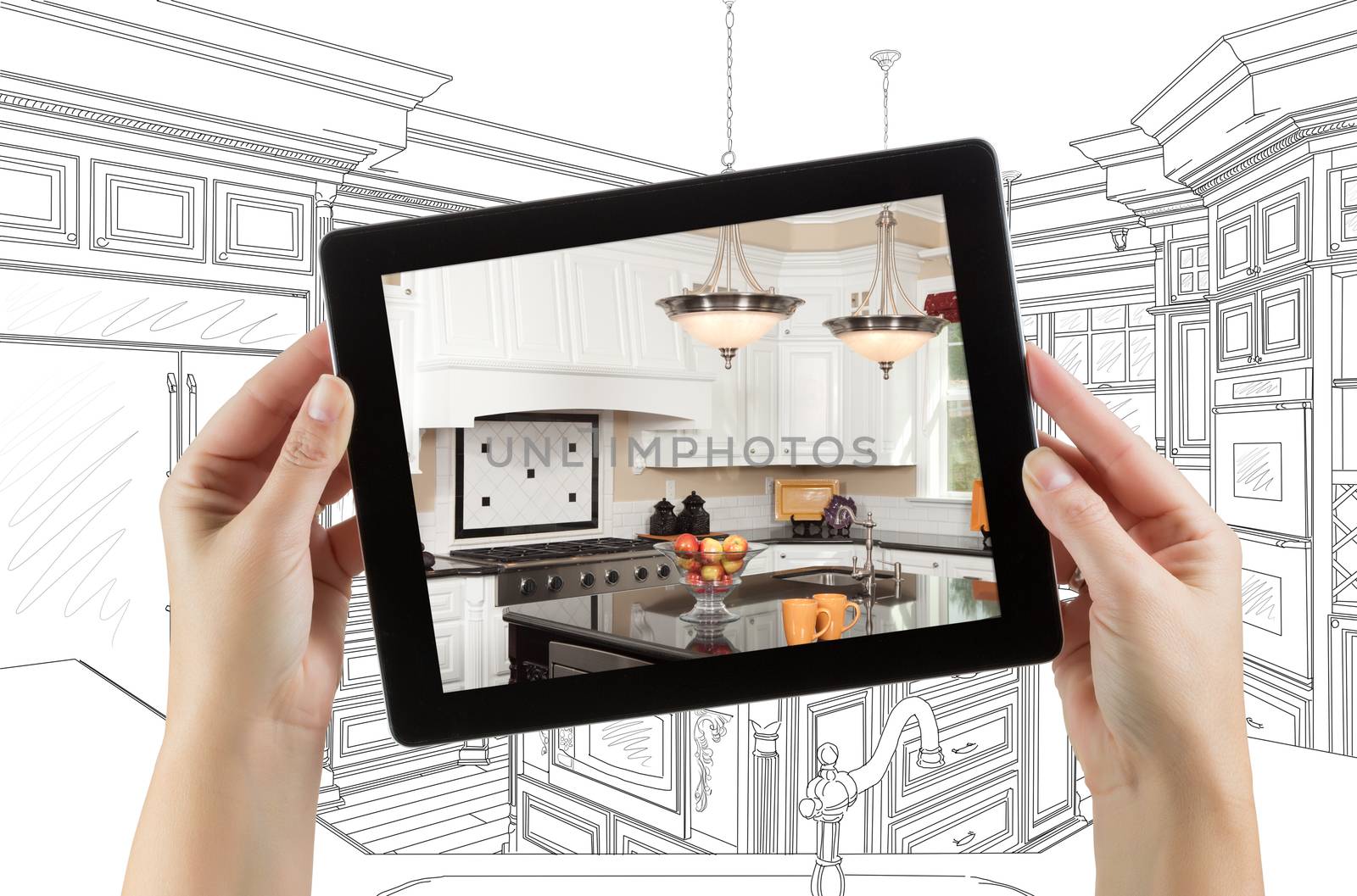 Female Hands Holding Computer Tablet with Kitchen on Screen &amp; Drawing Behind. by Feverpitched