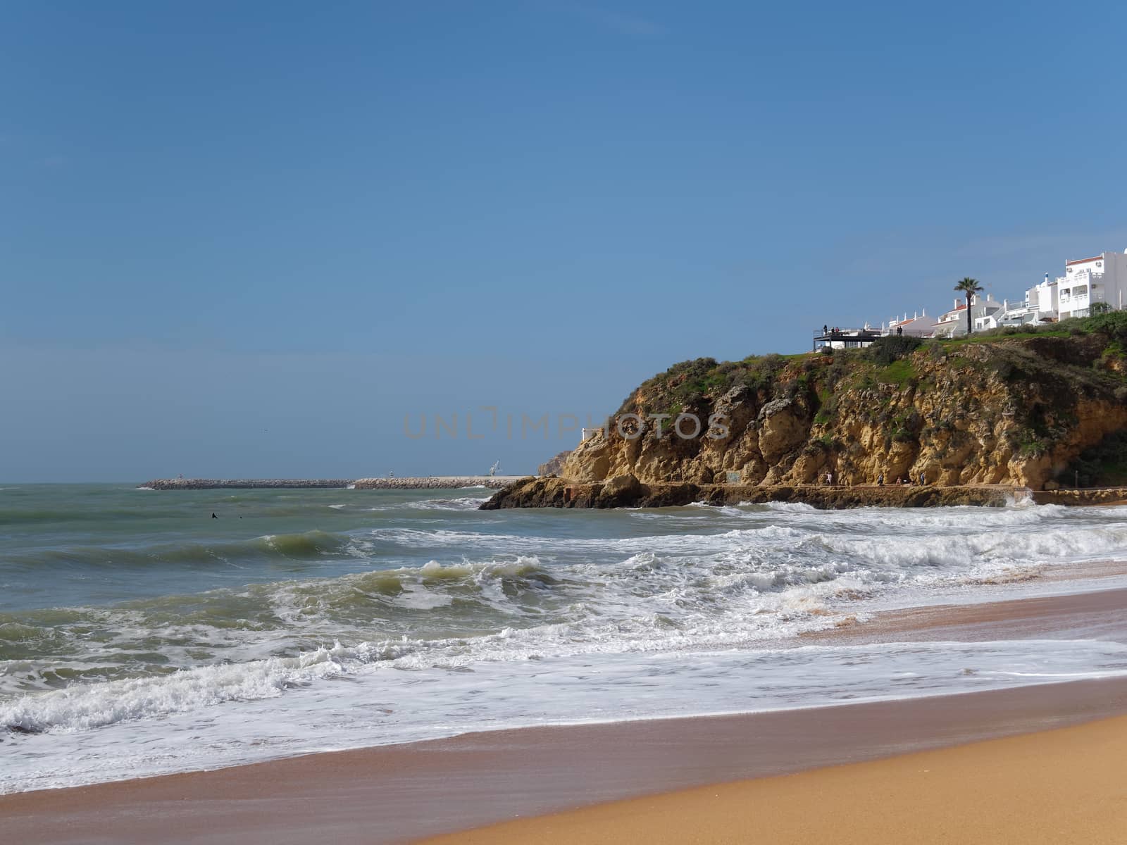 ALBUFEIRA, SOUTHERN ALGARVE/PORTUGAL - MARCH 10 : View of the Beach at Albufeira in Portugal on March 10, 2018. Unidentified people