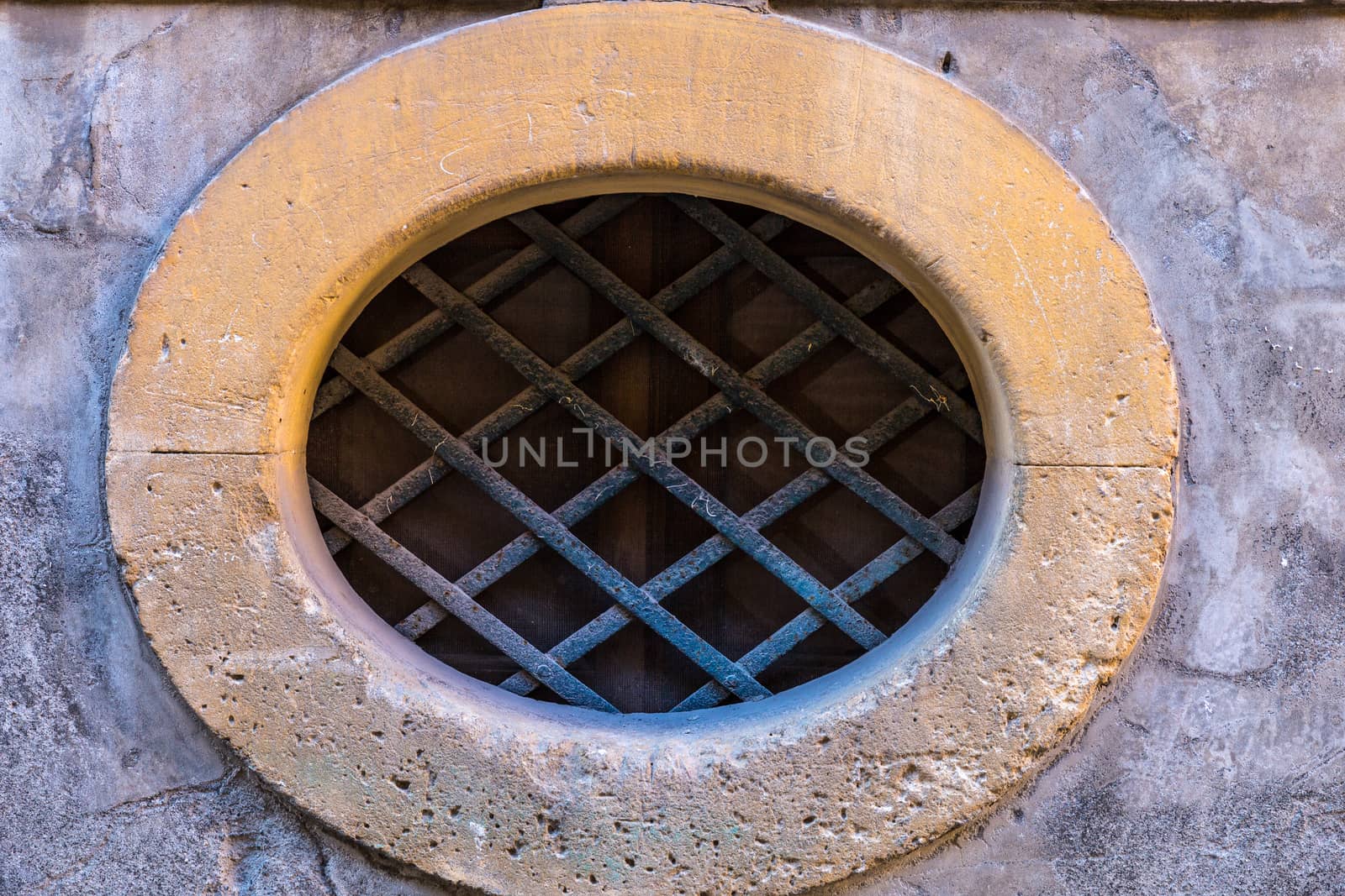 the green window on red ancient wall