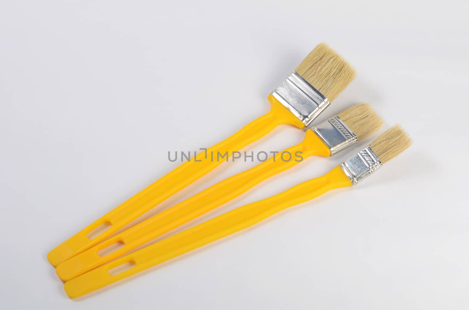 The yellow brush for painting paint by SvetaVo