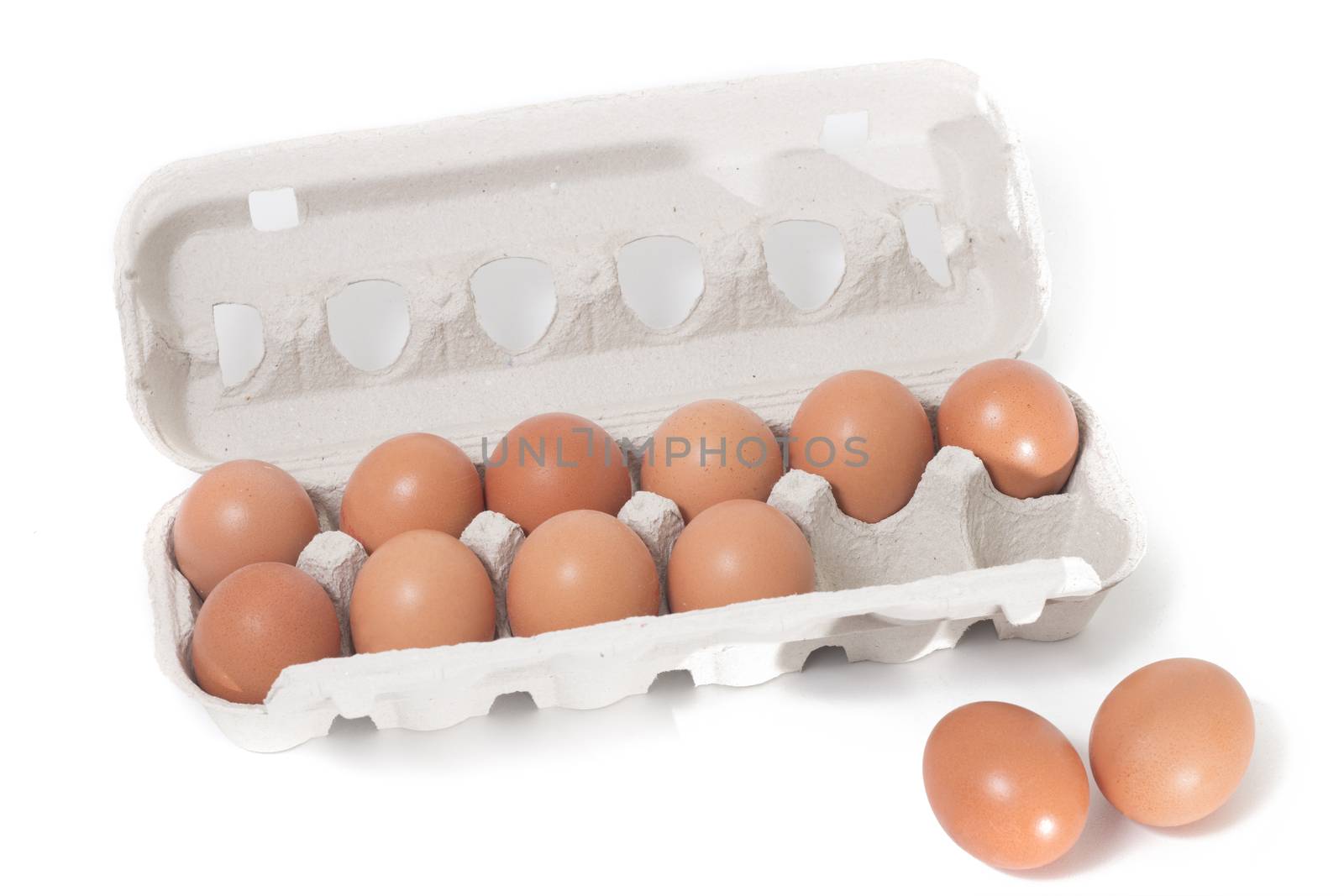 eggs inside cardboard package isolated on a white background.