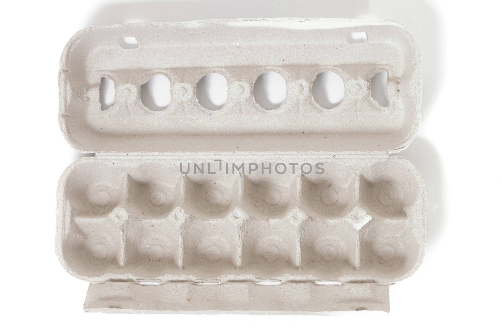 empty egg cardboard package isolated on a white background.