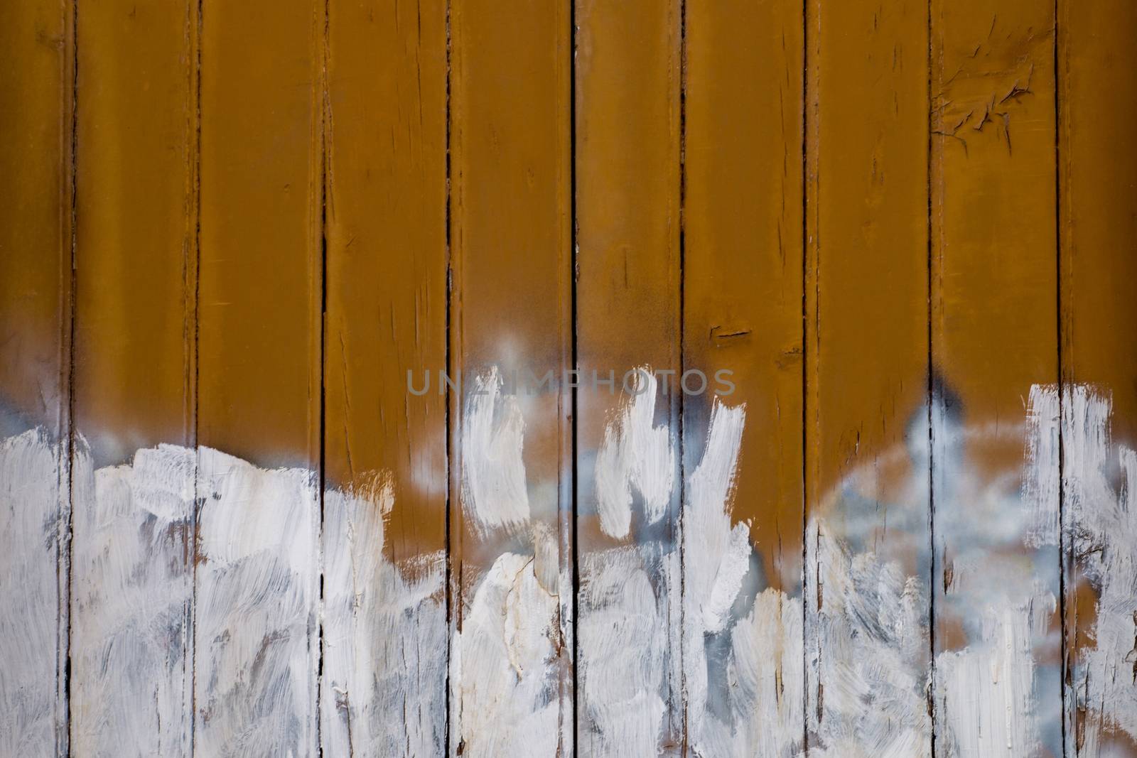 old wood texture with white paint backdrop.