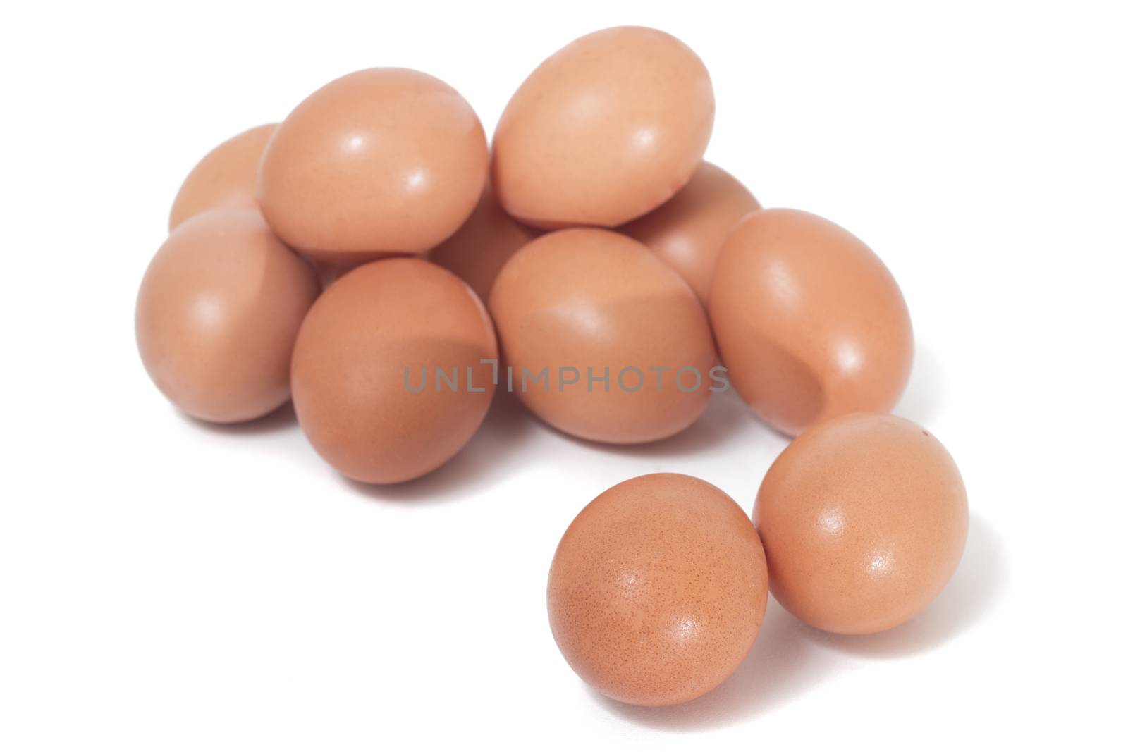 pile of chicken eggs isolated on a white background.