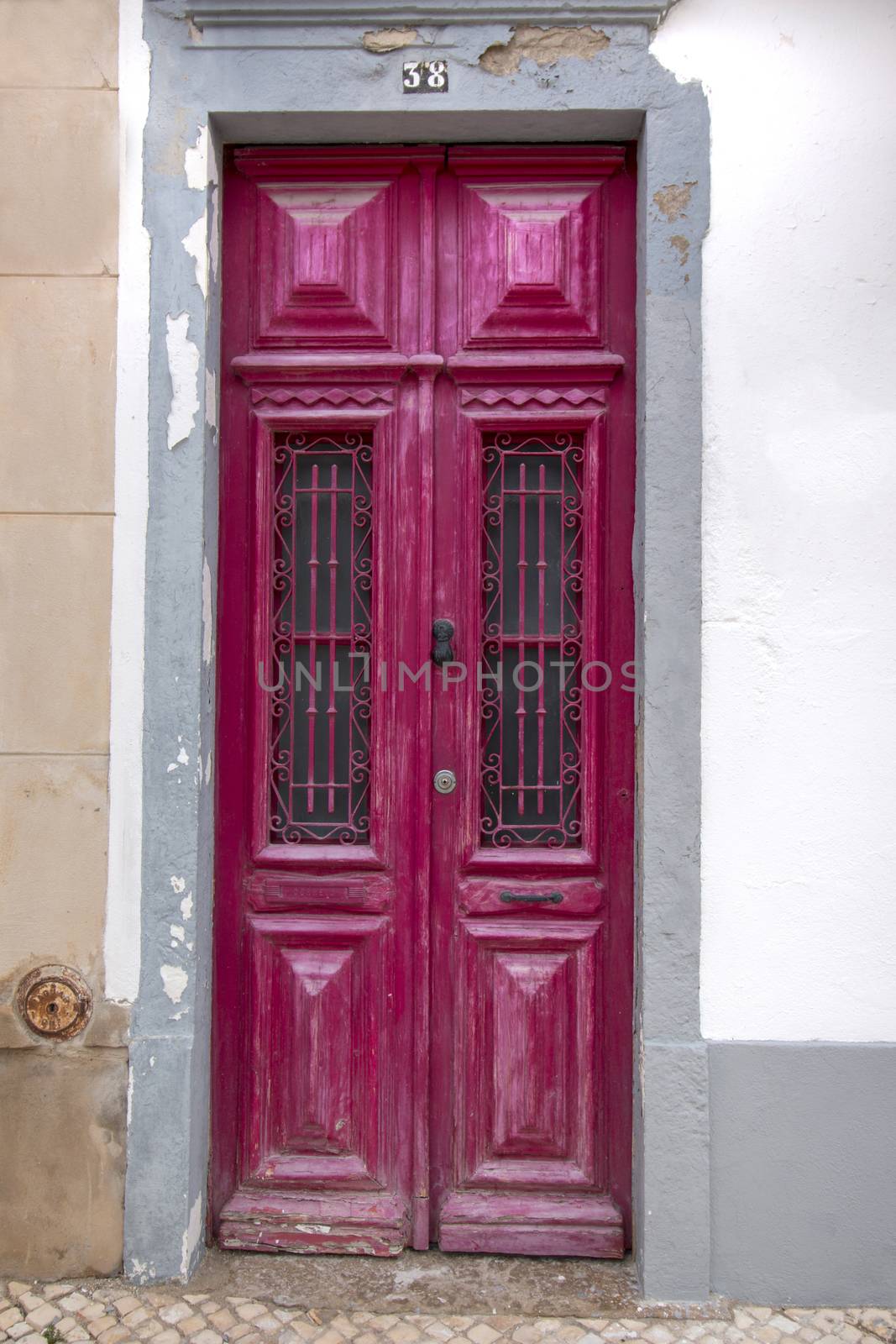 Typical wooden doors of Portuguese architecture in buildings.