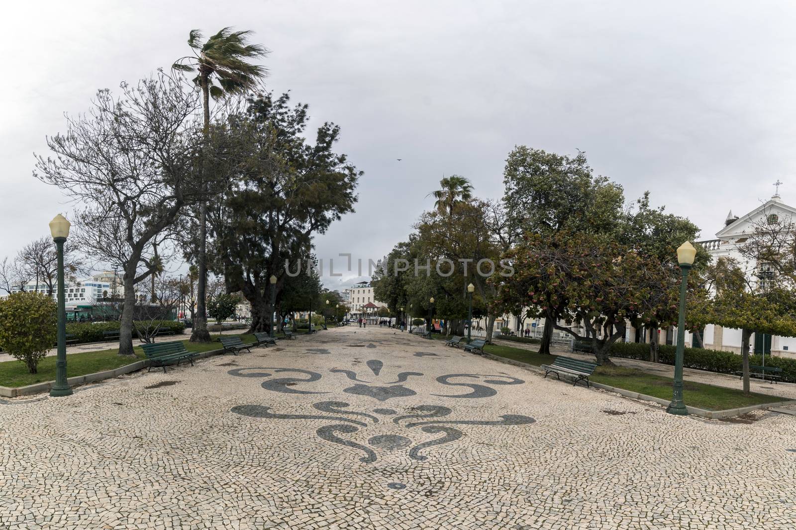 View of the Garden Manuel Bivar in Faro city with cobblestone art.