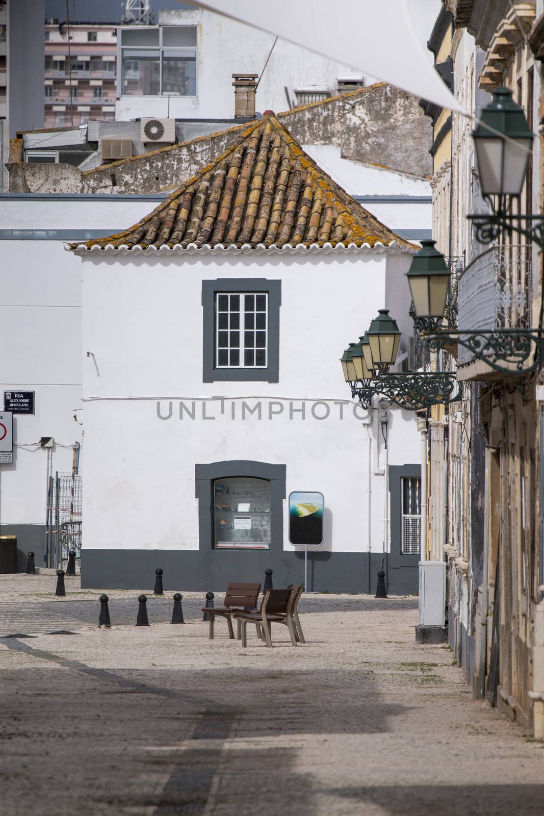 typical street in Faro city by membio