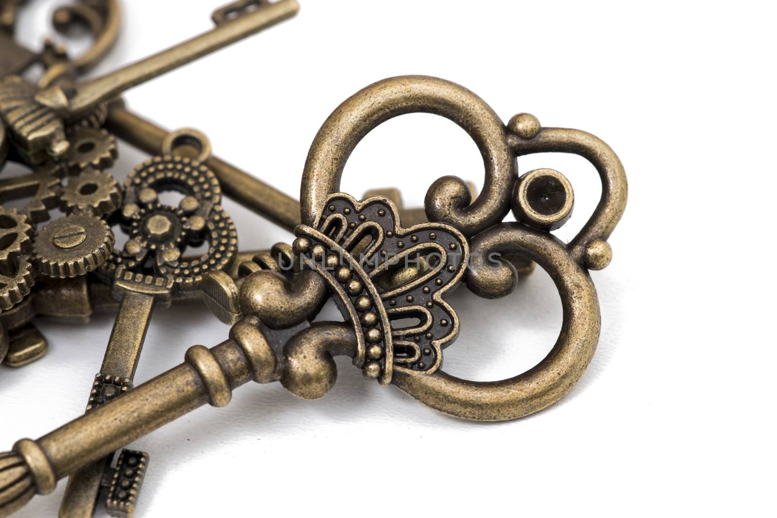 vintage fantasy detailed golden keys isolated on a white background.