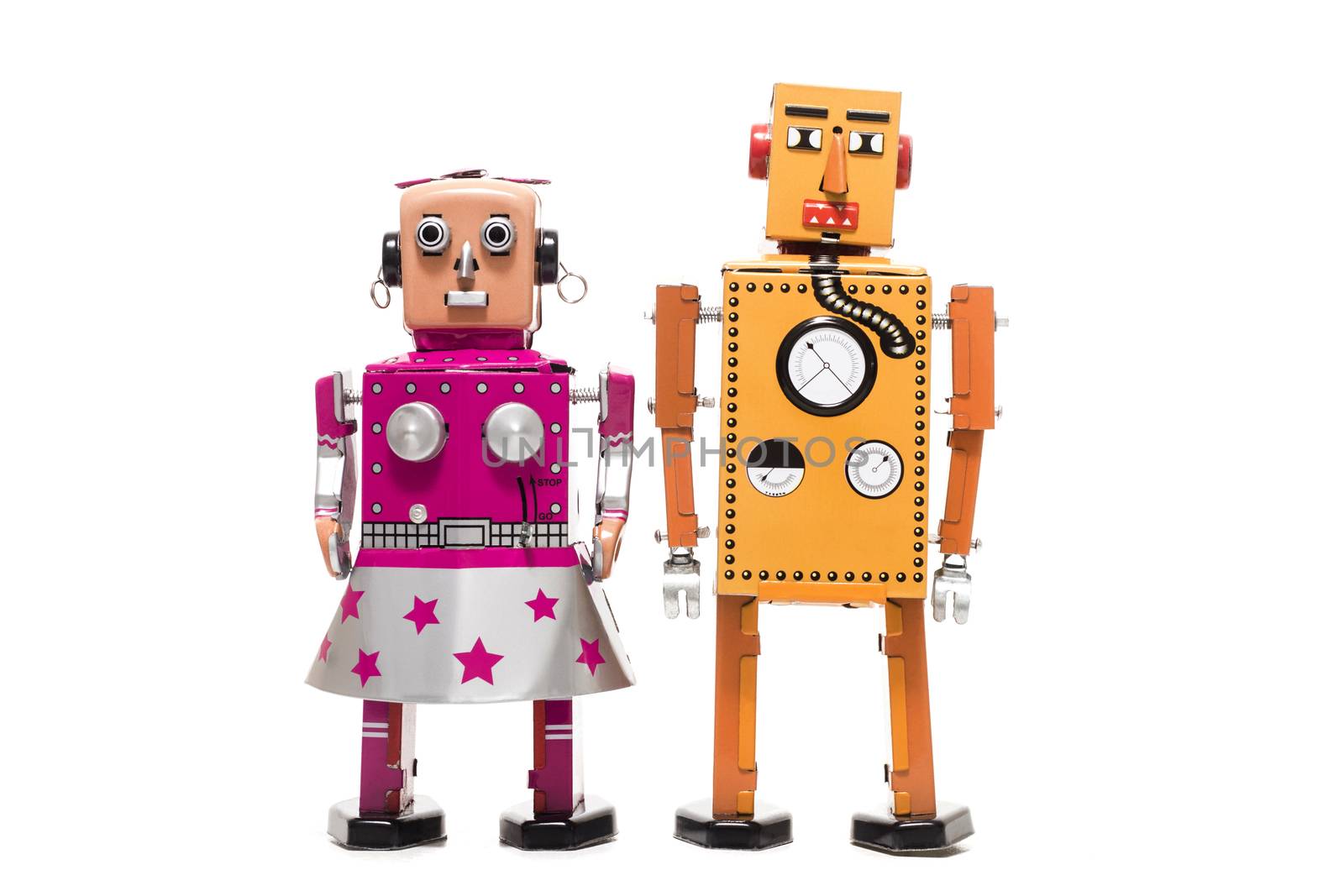 Vintage retro  tin toy robot couple concept isolated on a white background.