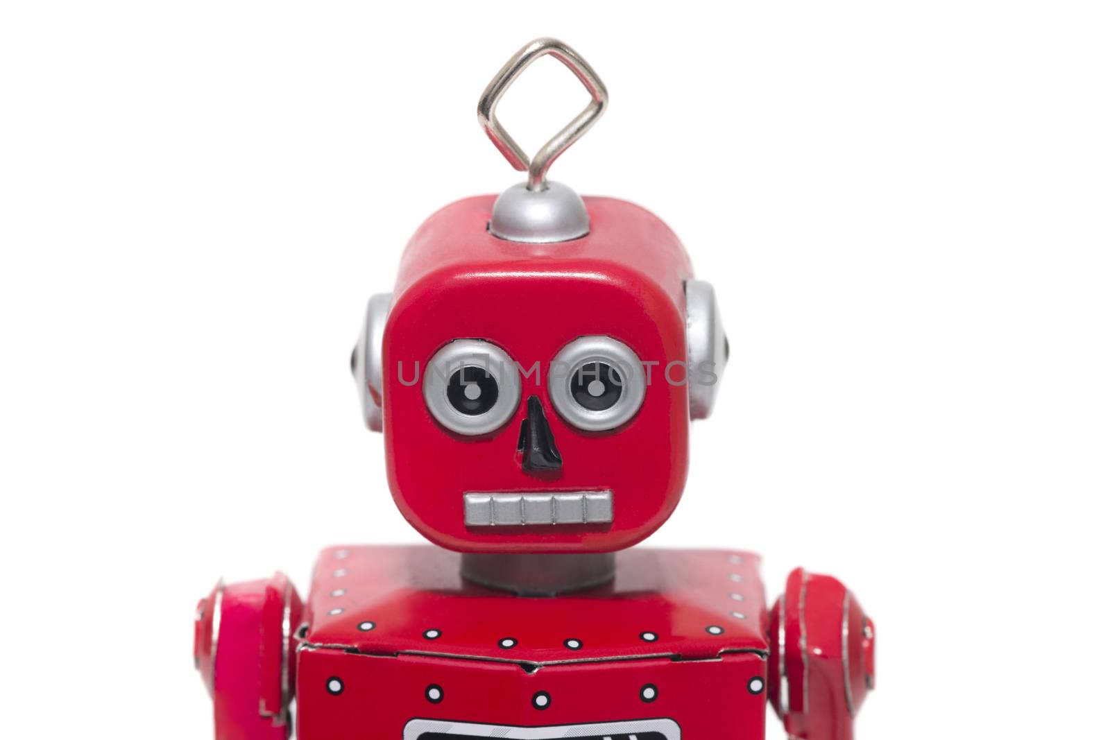 Vintage retro red tin toy robot isolated on a white background.