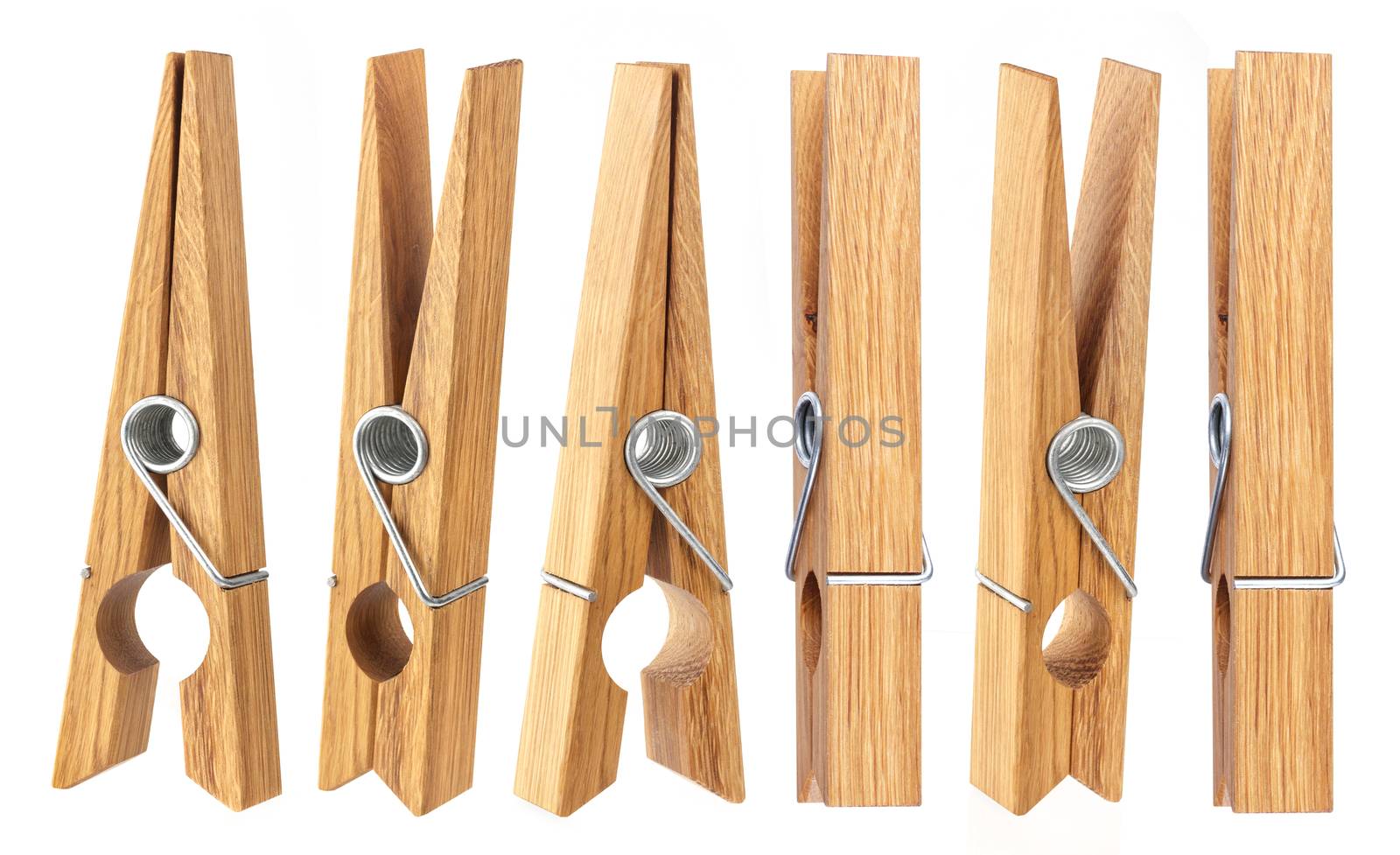 Set of wooden clothespins isolated on white background with clipping path