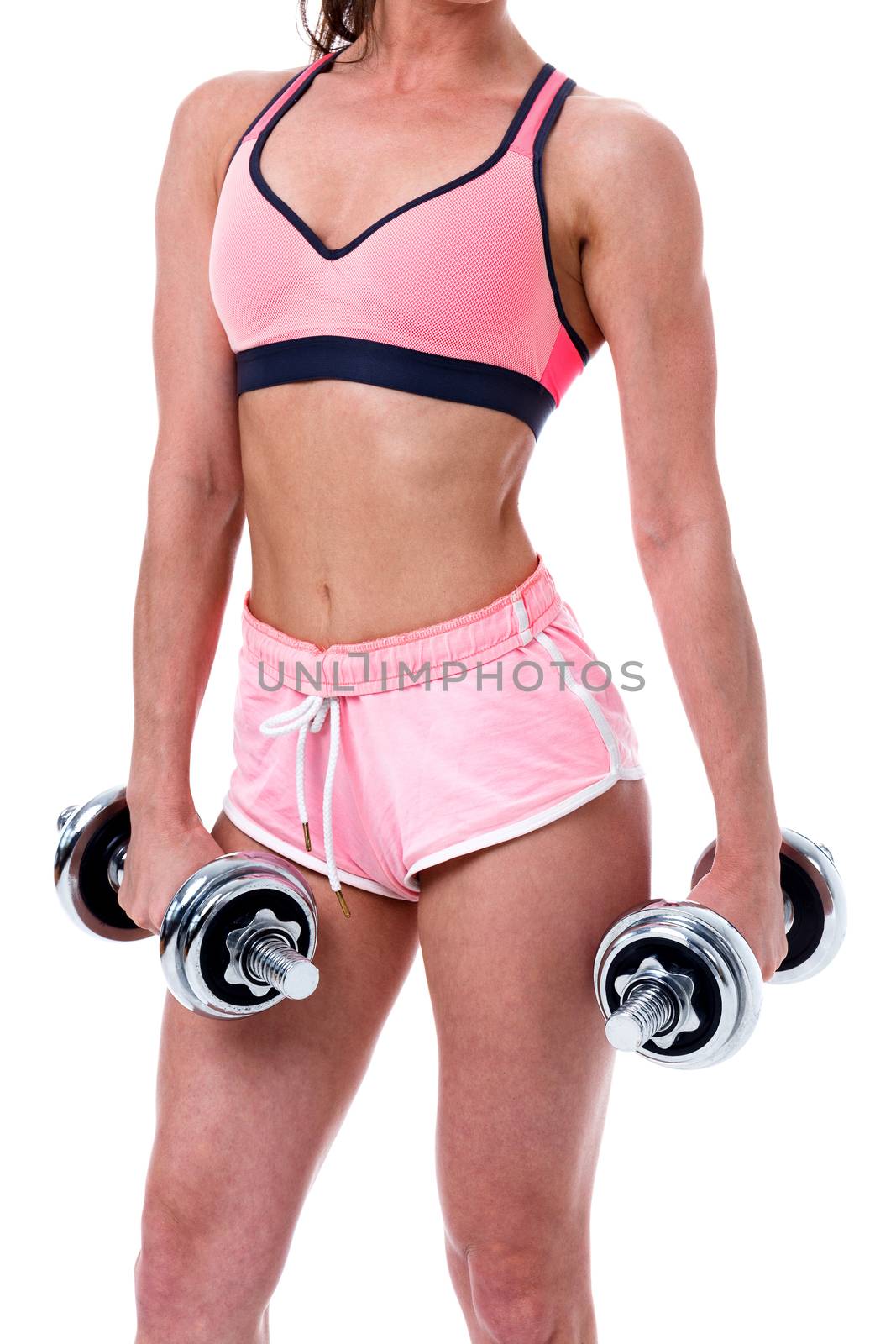 Girl bodybuilder on a white background with dumbbells in hands, isolated