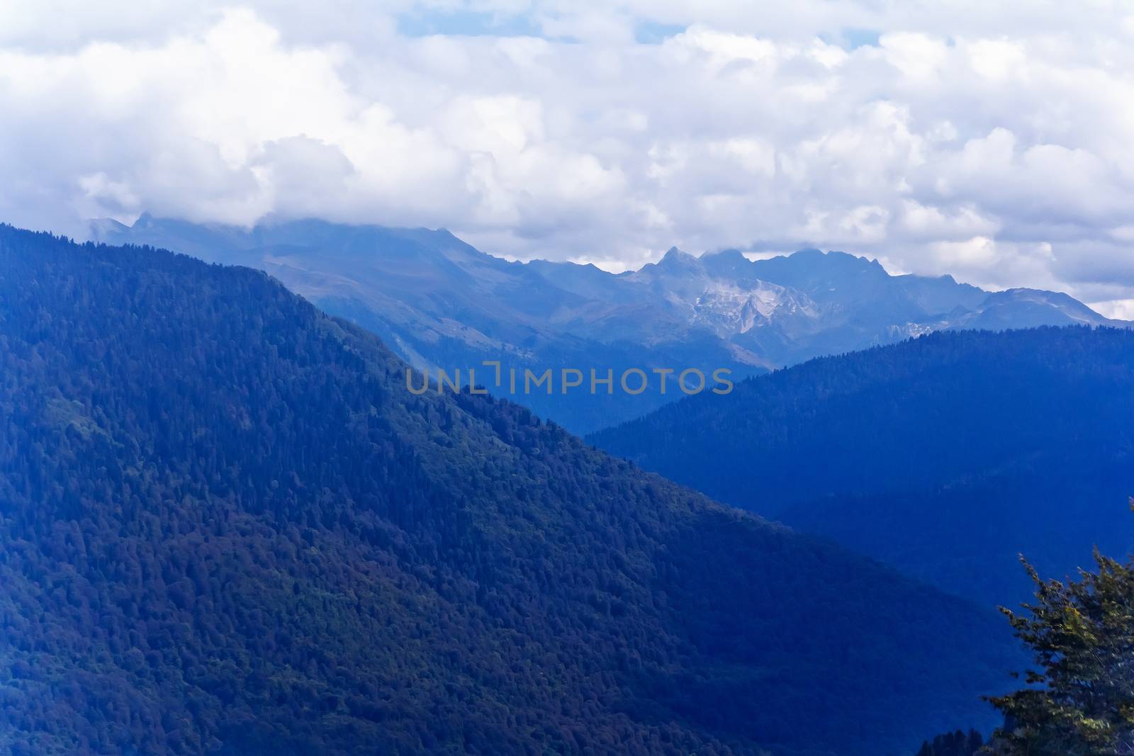 Blue Caucasus mountains in Russia by Julialine